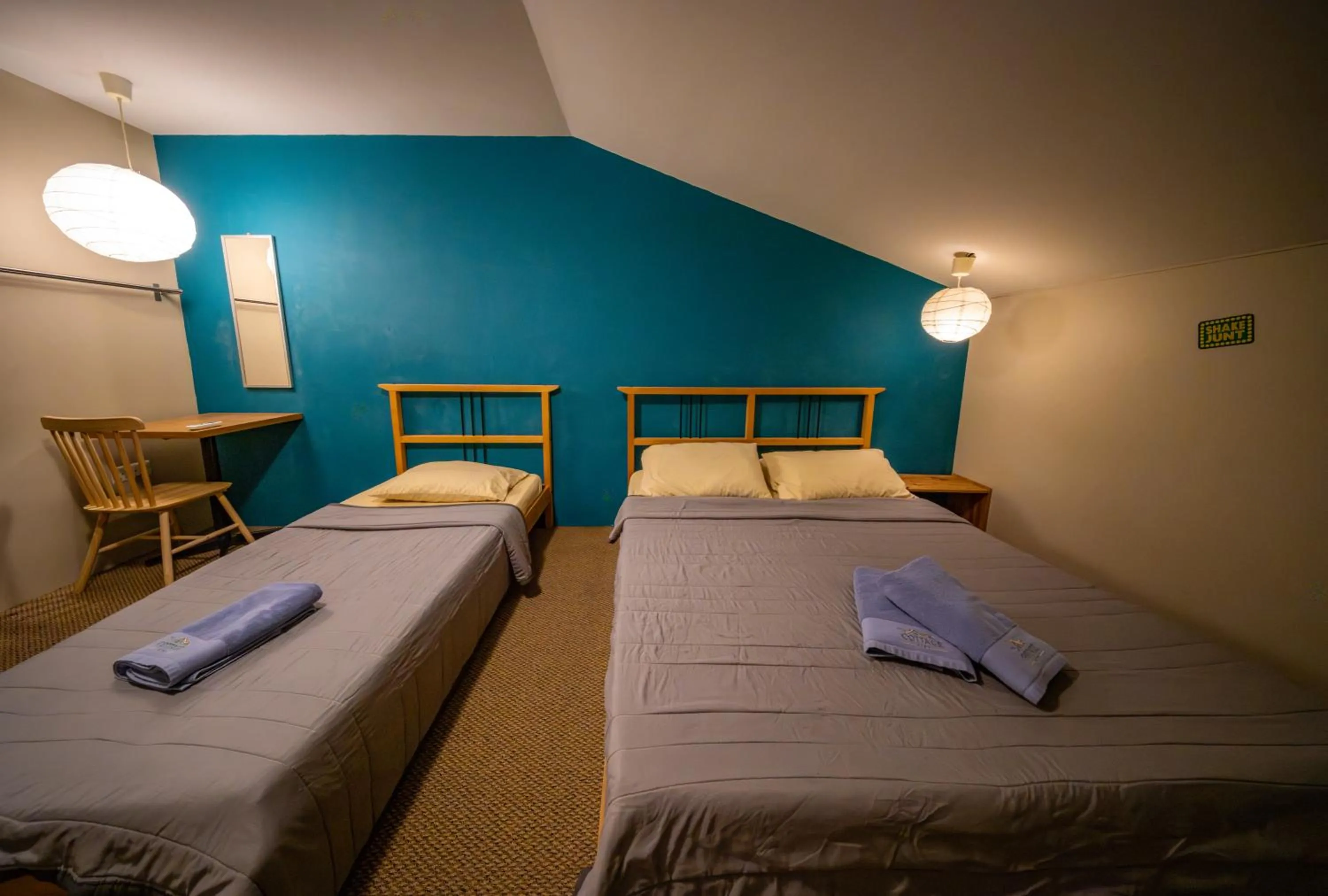 Economy Triple Room with Shared Bathroom in The Cottage Stay - self check-in