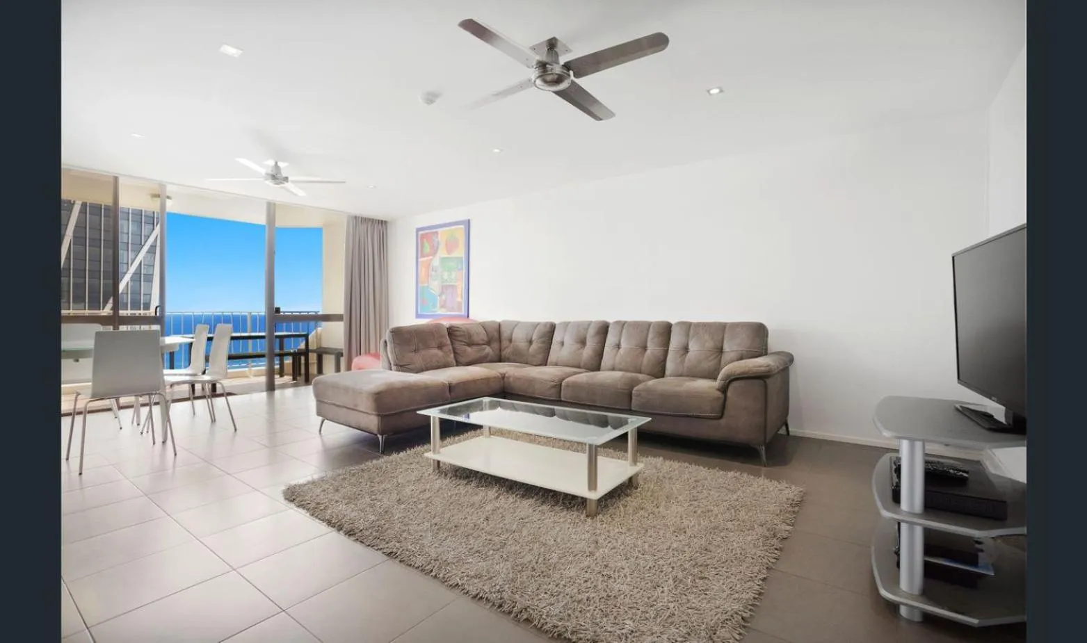 Living room in Breakers North Absolute Beachfront Apartments - Official