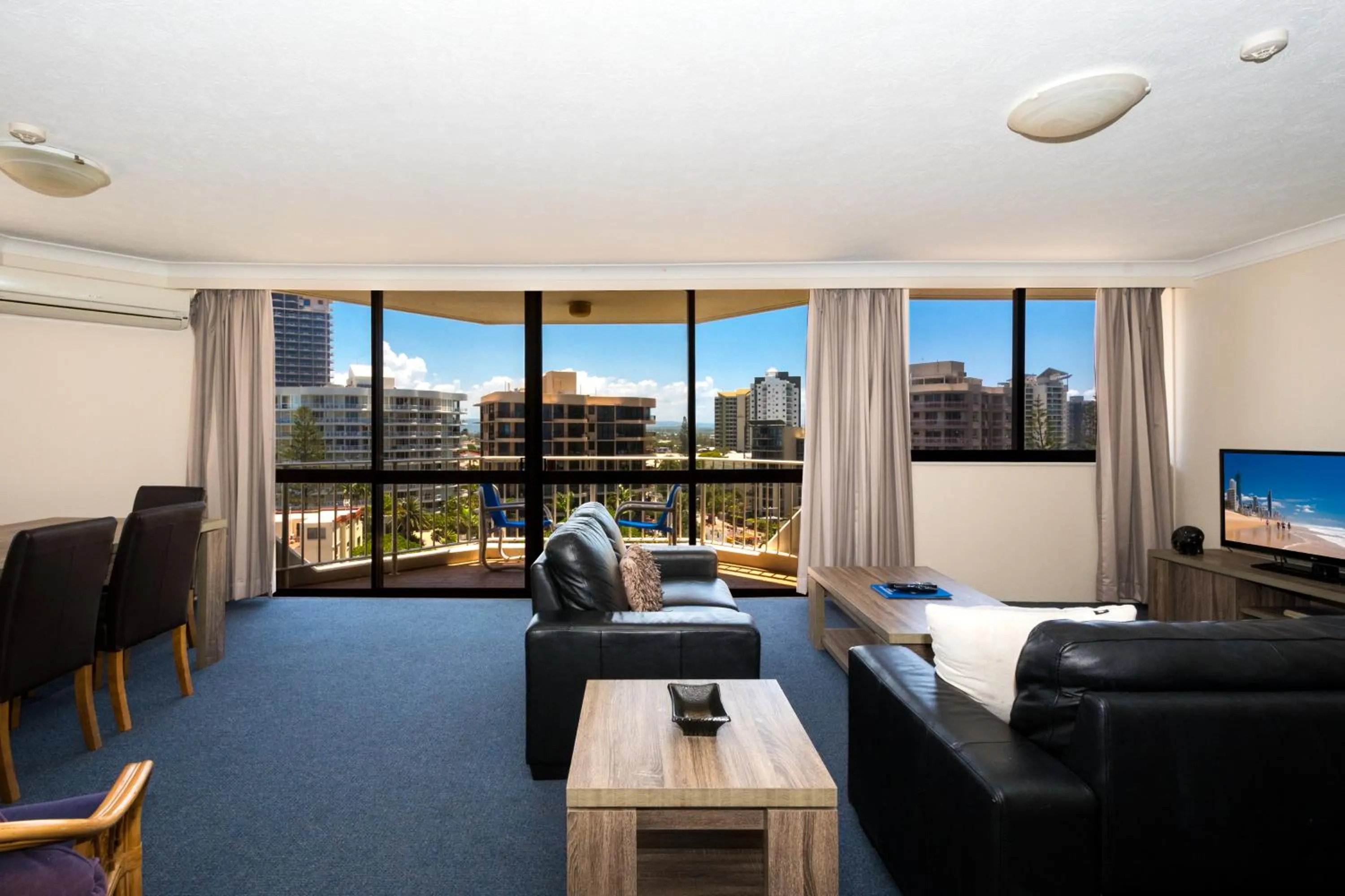 Living room in Breakers North Absolute Beachfront Apartments - Official