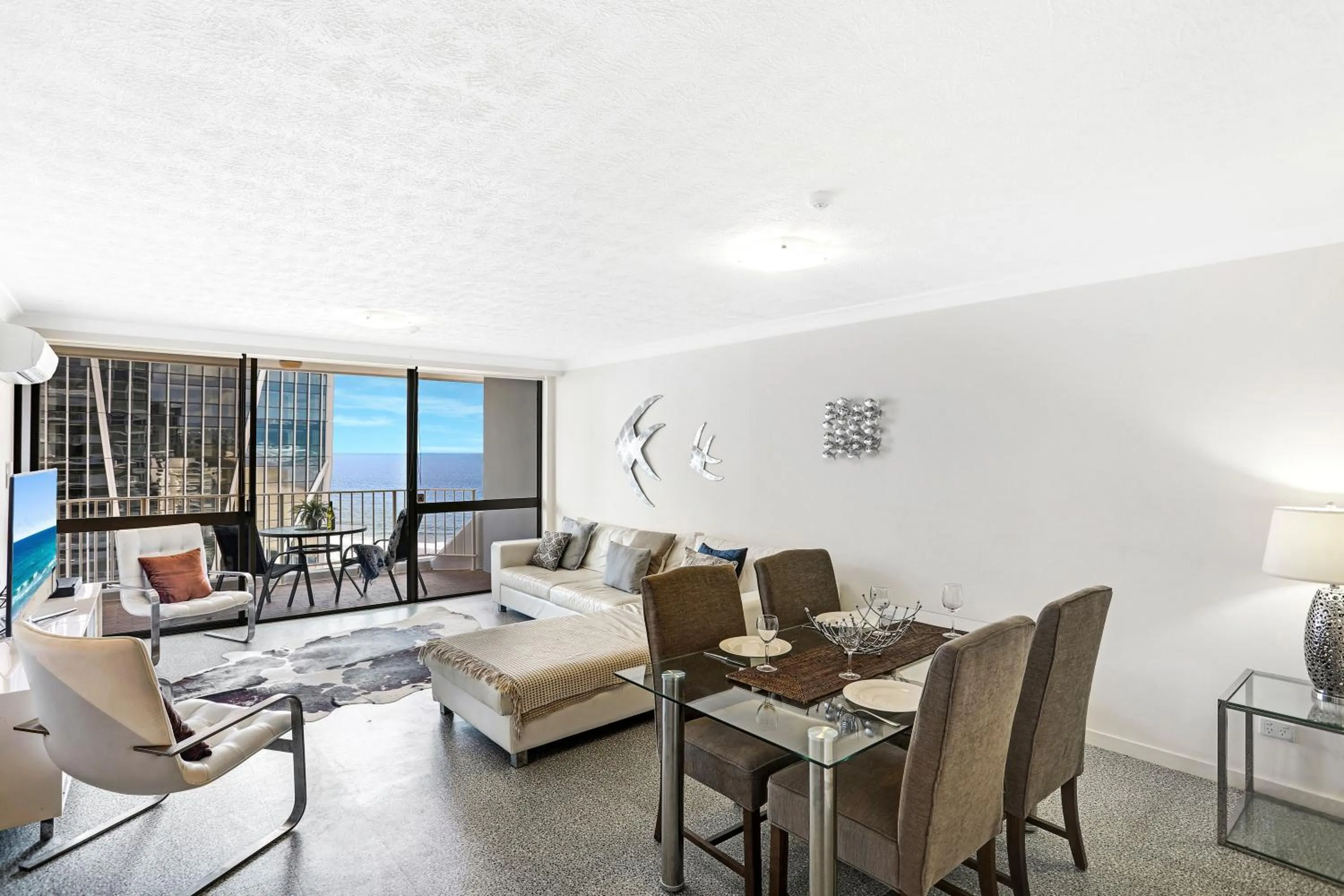 Living room in Breakers North Absolute Beachfront Apartments - Official