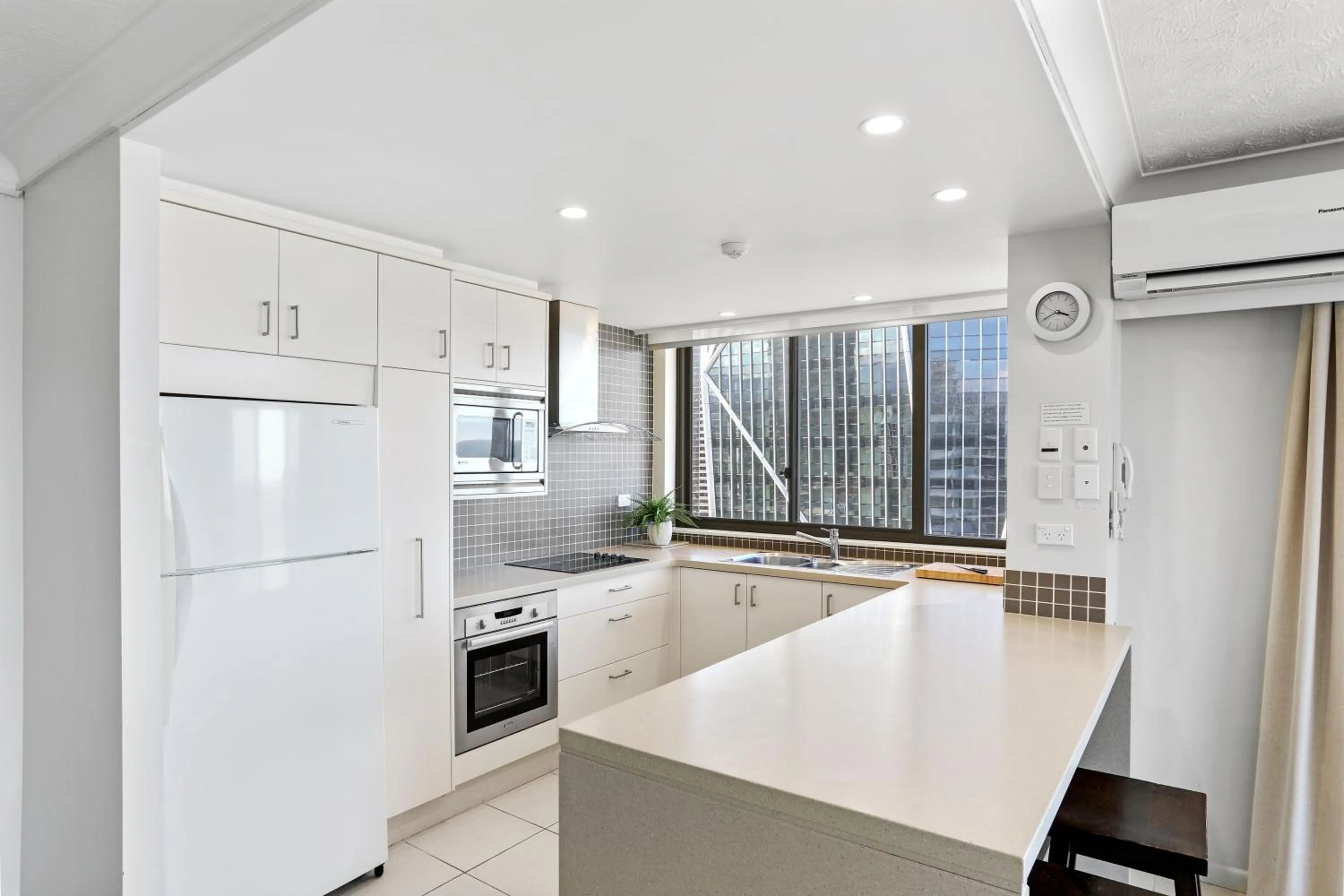 Kitchen or kitchenette in Breakers North Absolute Beachfront Apartments - Official