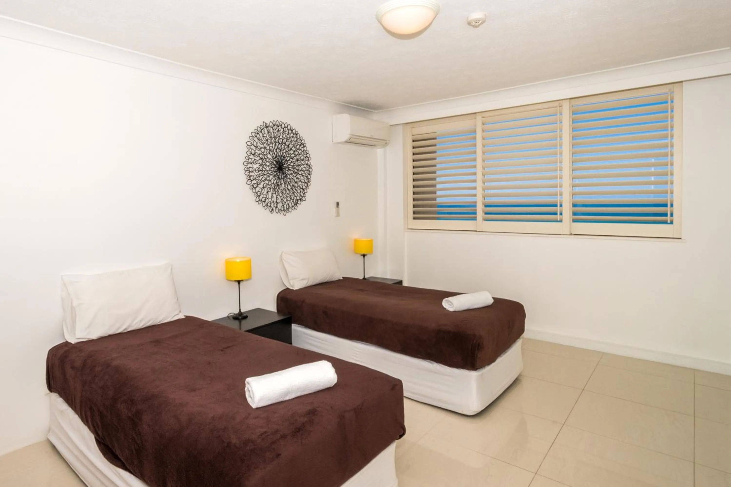 Bedroom, Bed in Breakers North Absolute Beachfront Apartments - Official