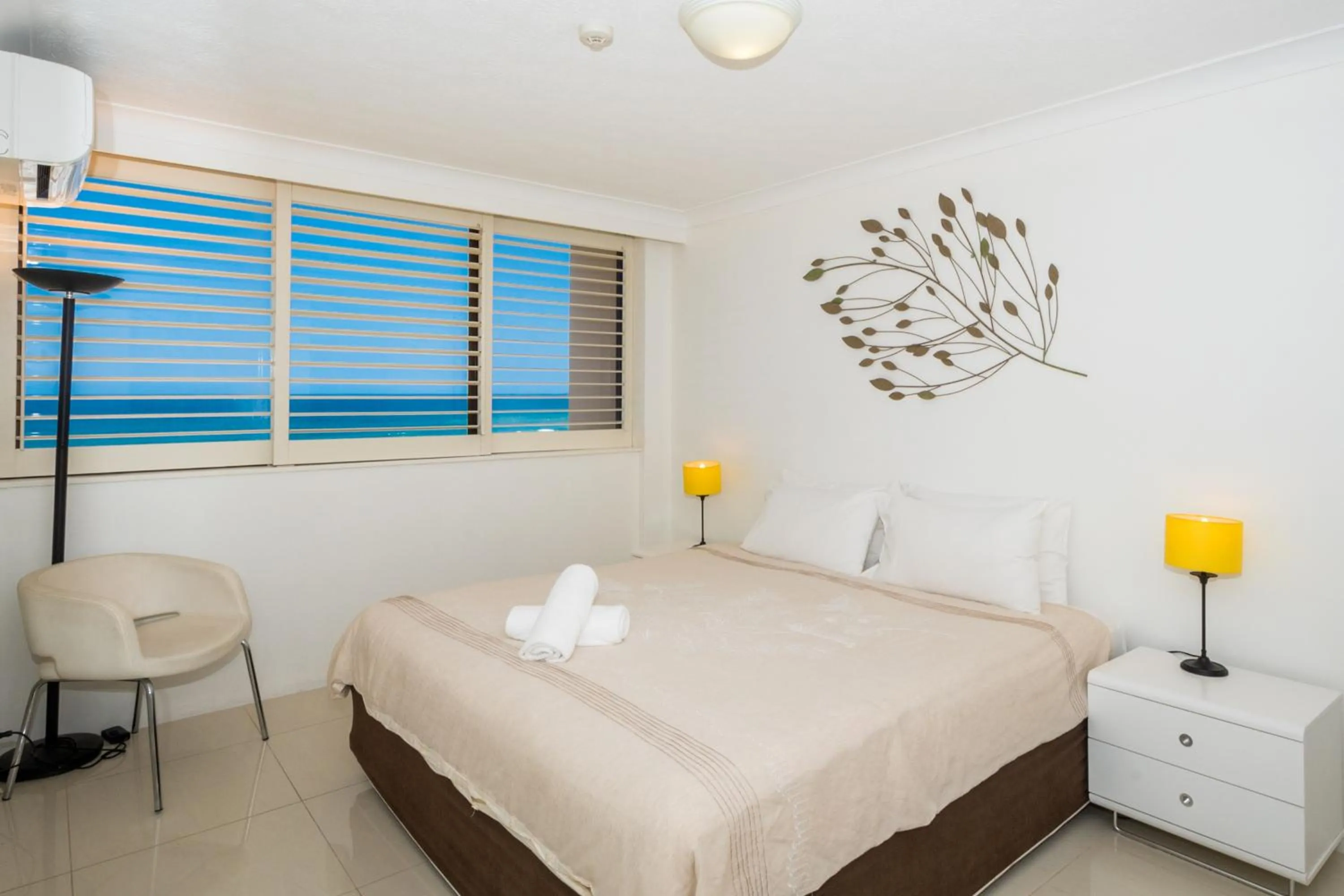 Bedroom, Bed in Breakers North Absolute Beachfront Apartments - Official