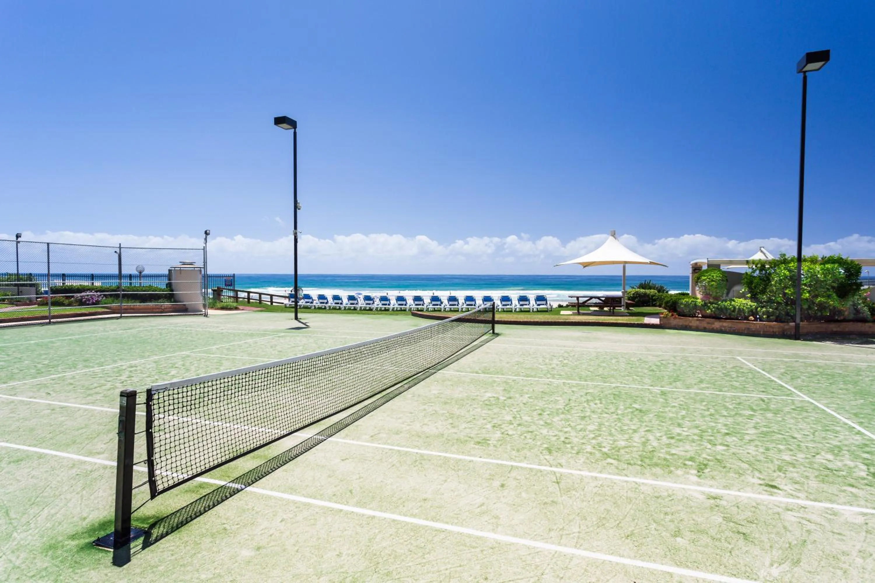 Tennis court in Breakers North Absolute Beachfront Apartments - Official