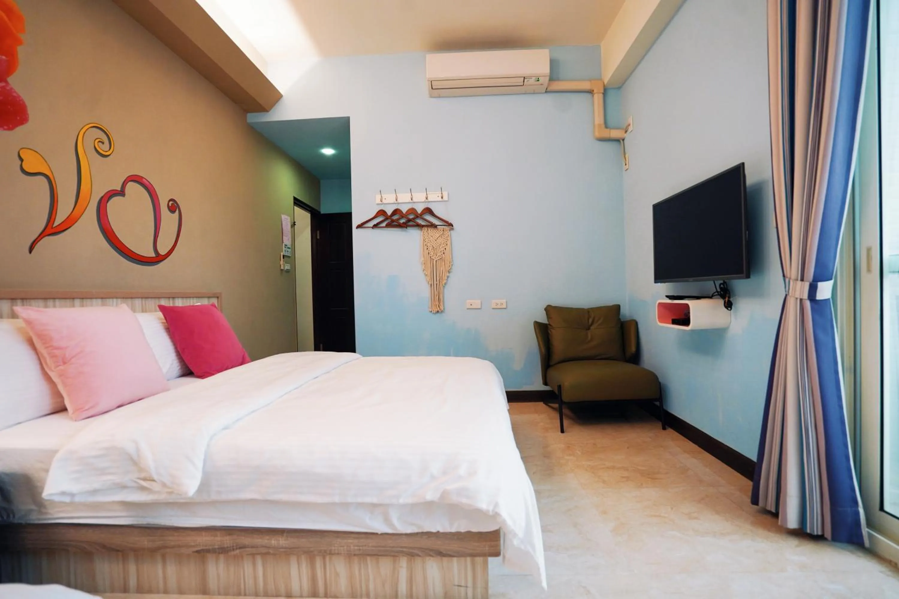 Bed in 夏之戀民宿 可包棟 近金城市區