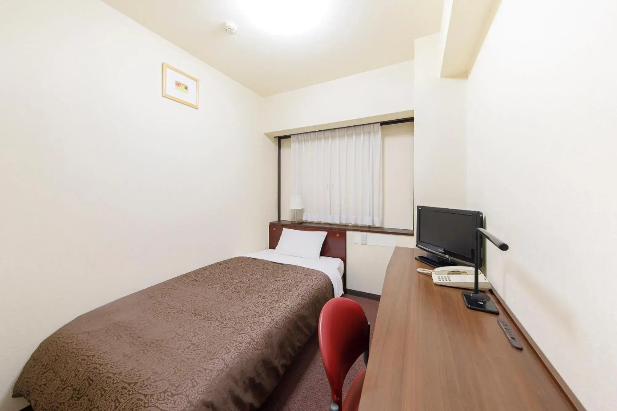 Bed in Dai-ni Sunny Stone Hotel Bed in Dai-ni Sunny Stone Hotel