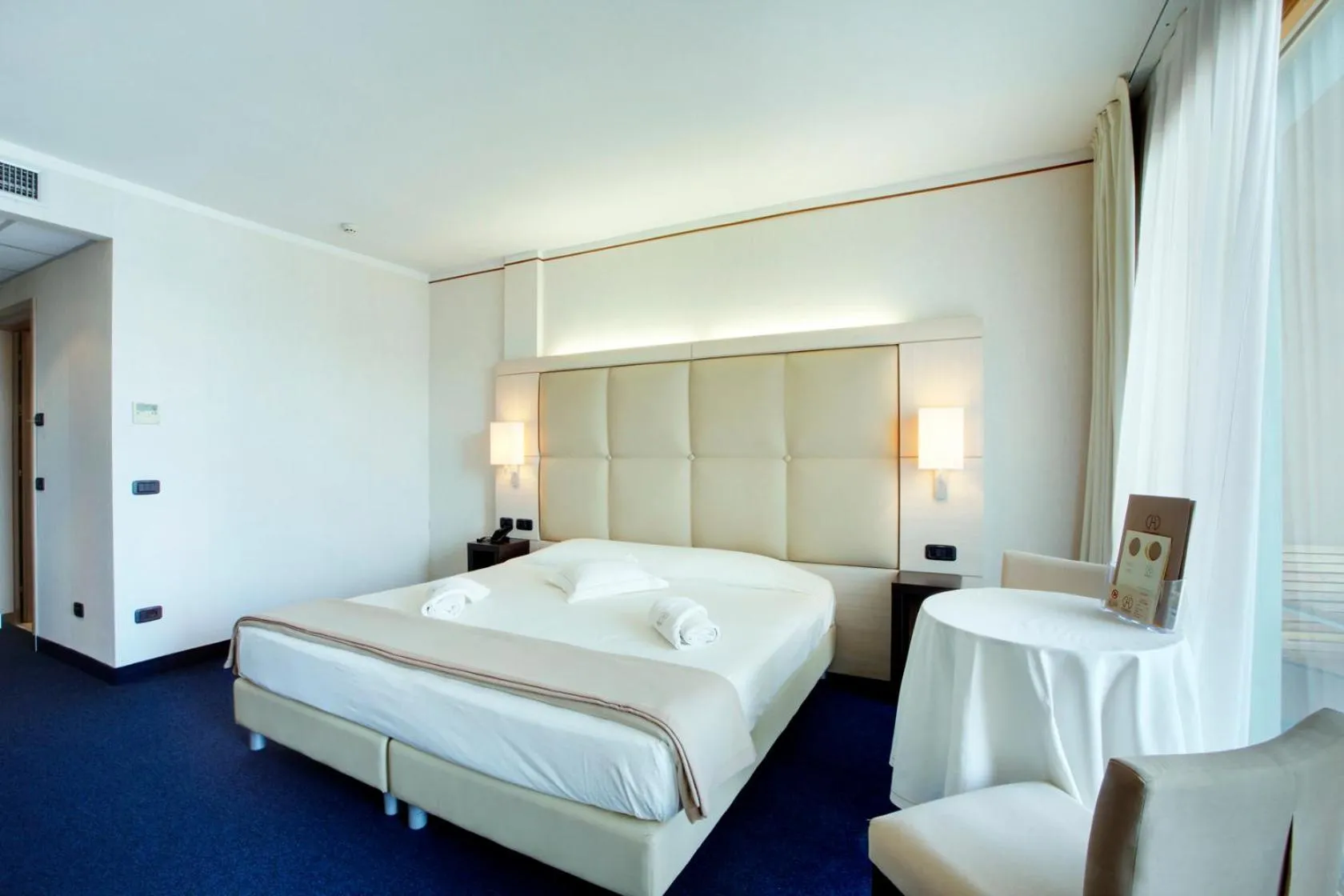 Bed in Cocca Hotel Royal Thai Spa