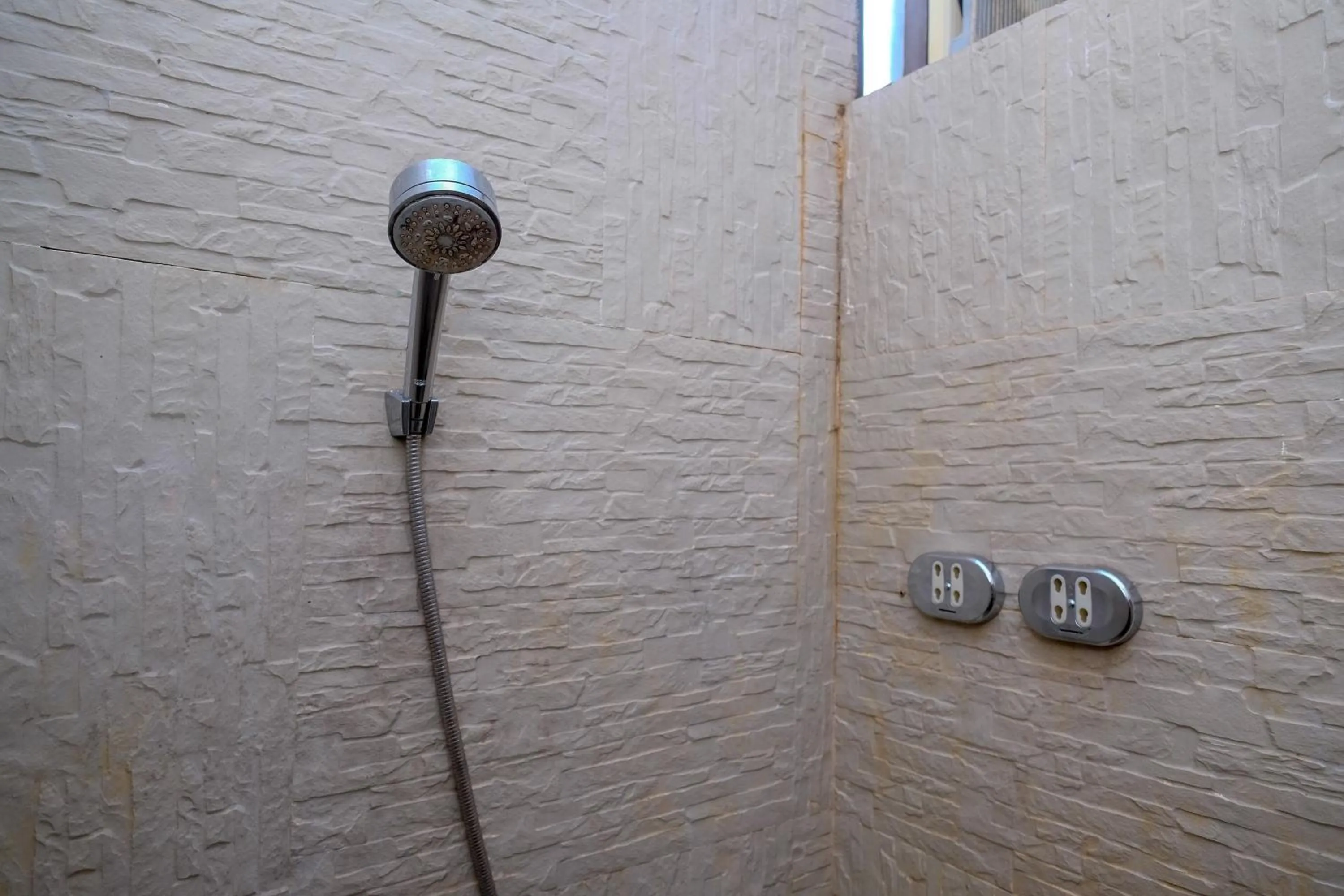 Bathroom in Urbanview Omah Eka Santi by RedDoorz