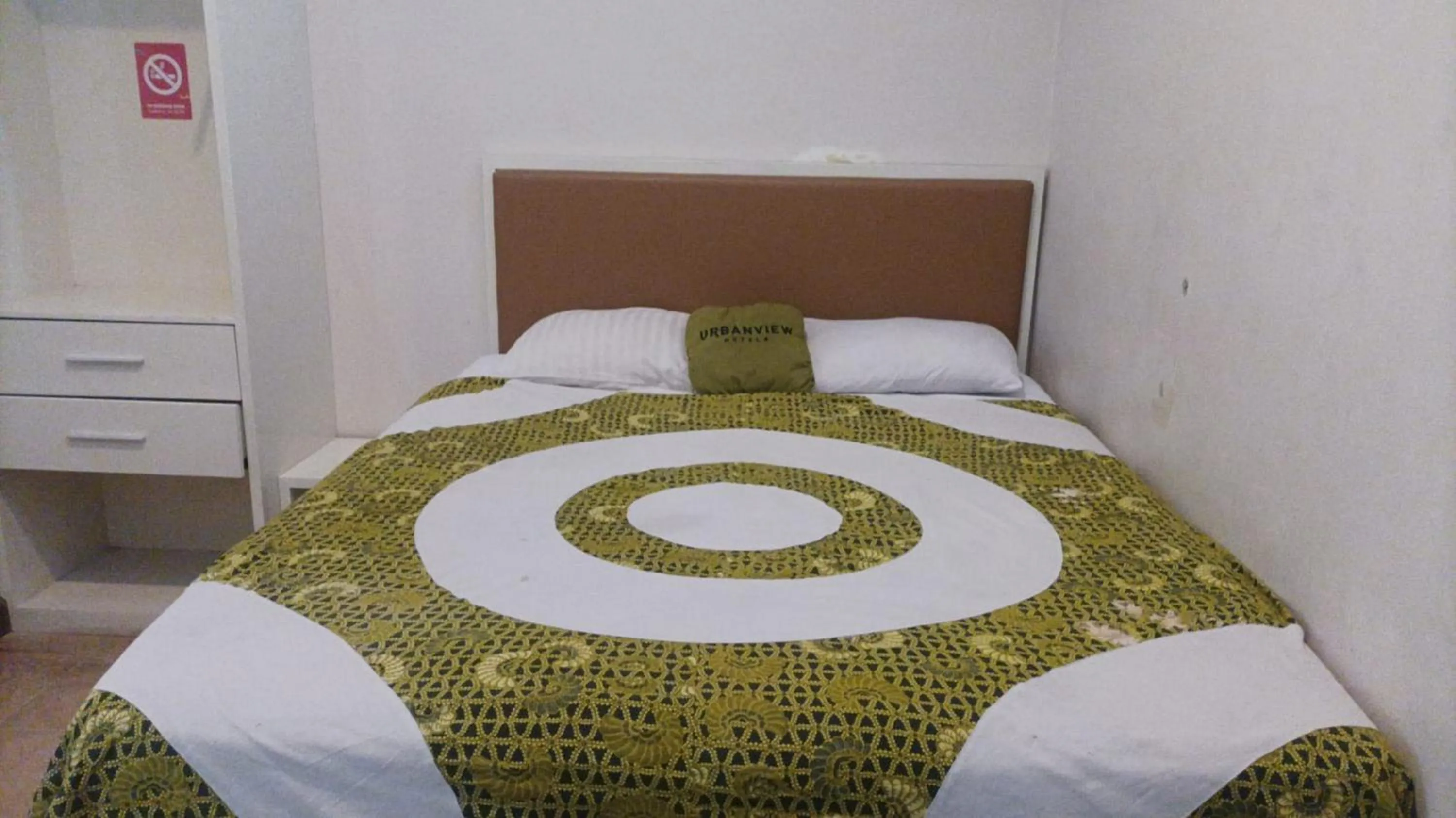 Bedroom, Bed in Urbanview Omah Eka Santi by RedDoorz