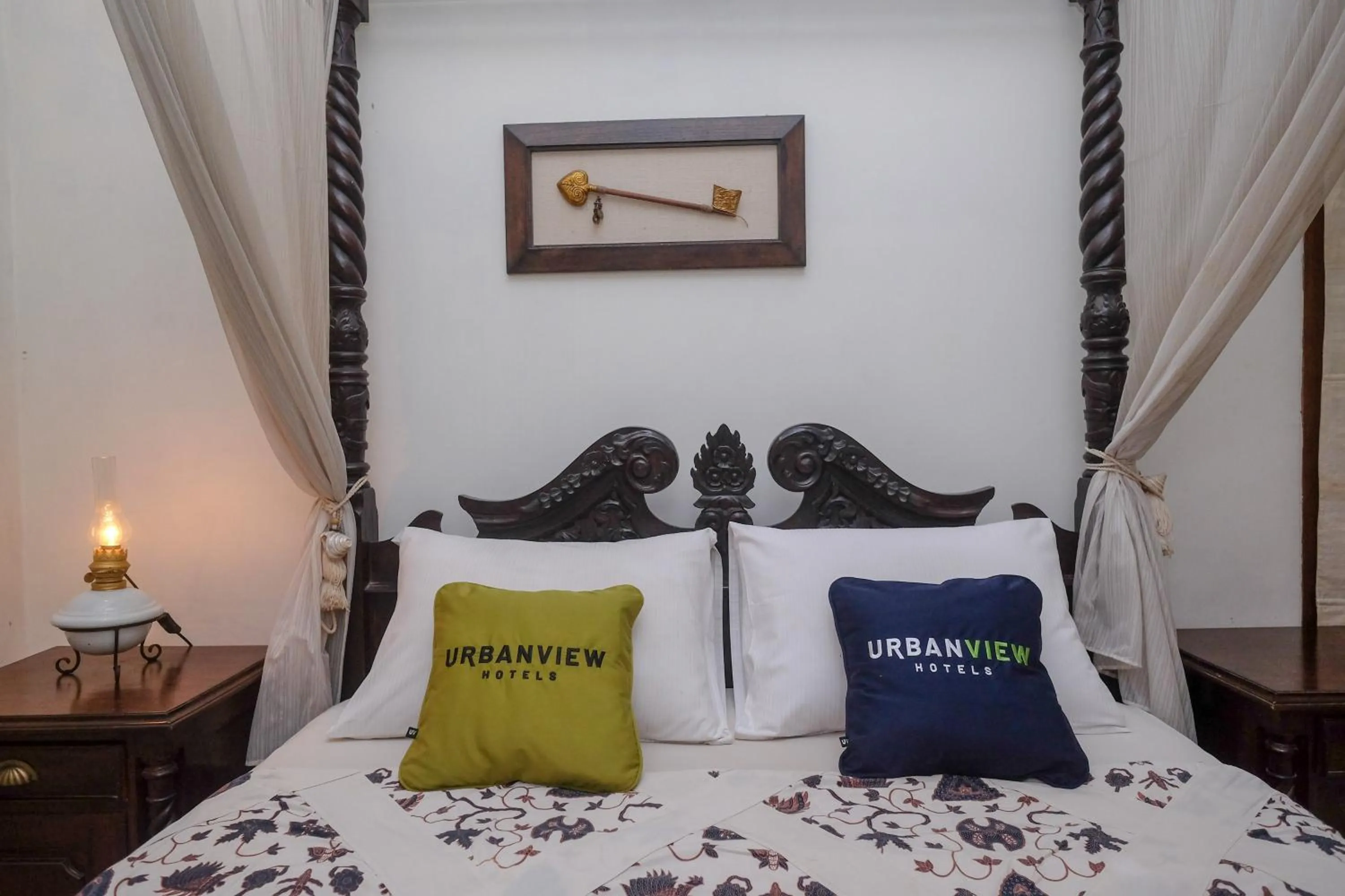 Bedroom, Bed in Urbanview Omah Eka Santi by RedDoorz