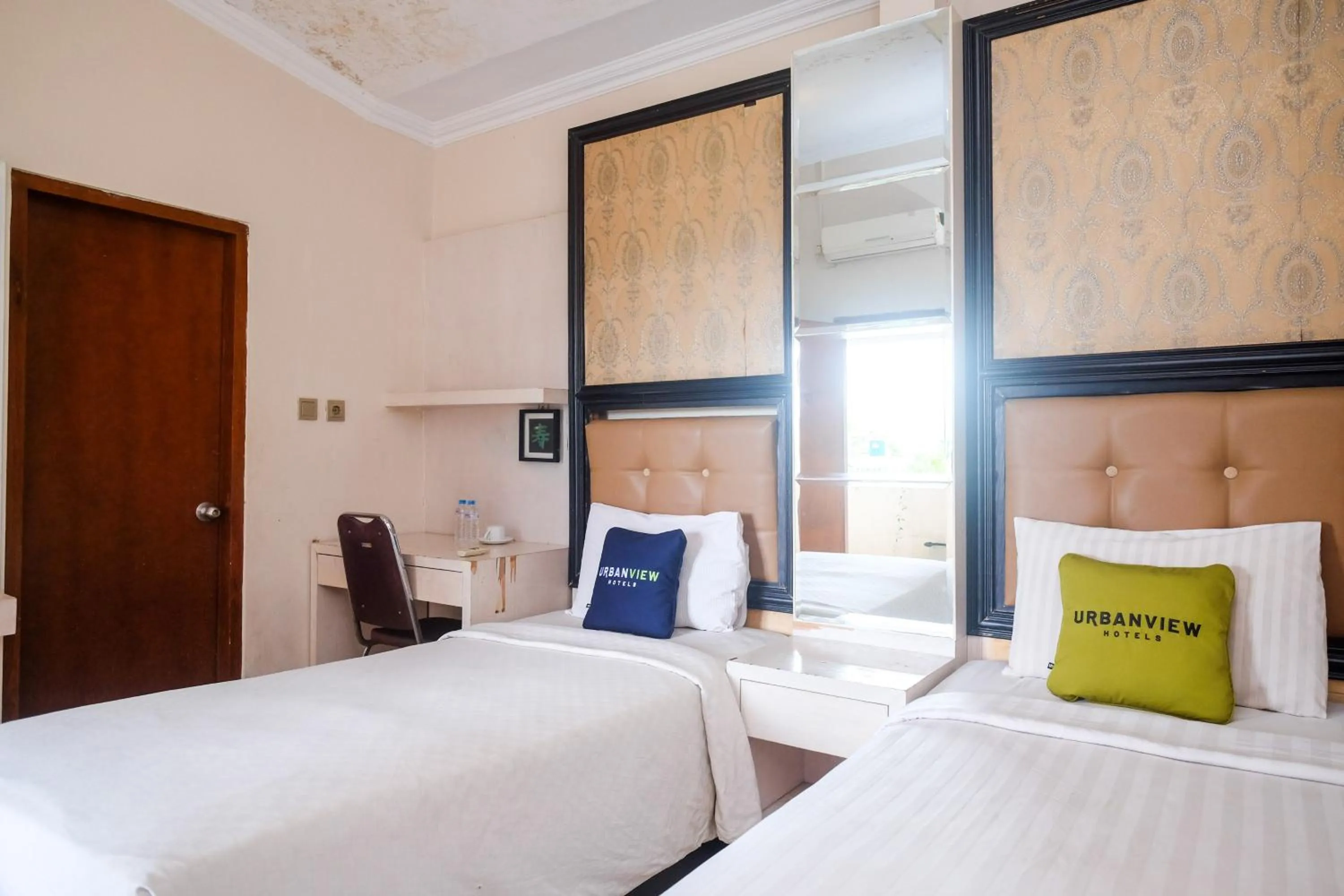 Bedroom, Bed in Urbanview Omah Eka Santi by RedDoorz