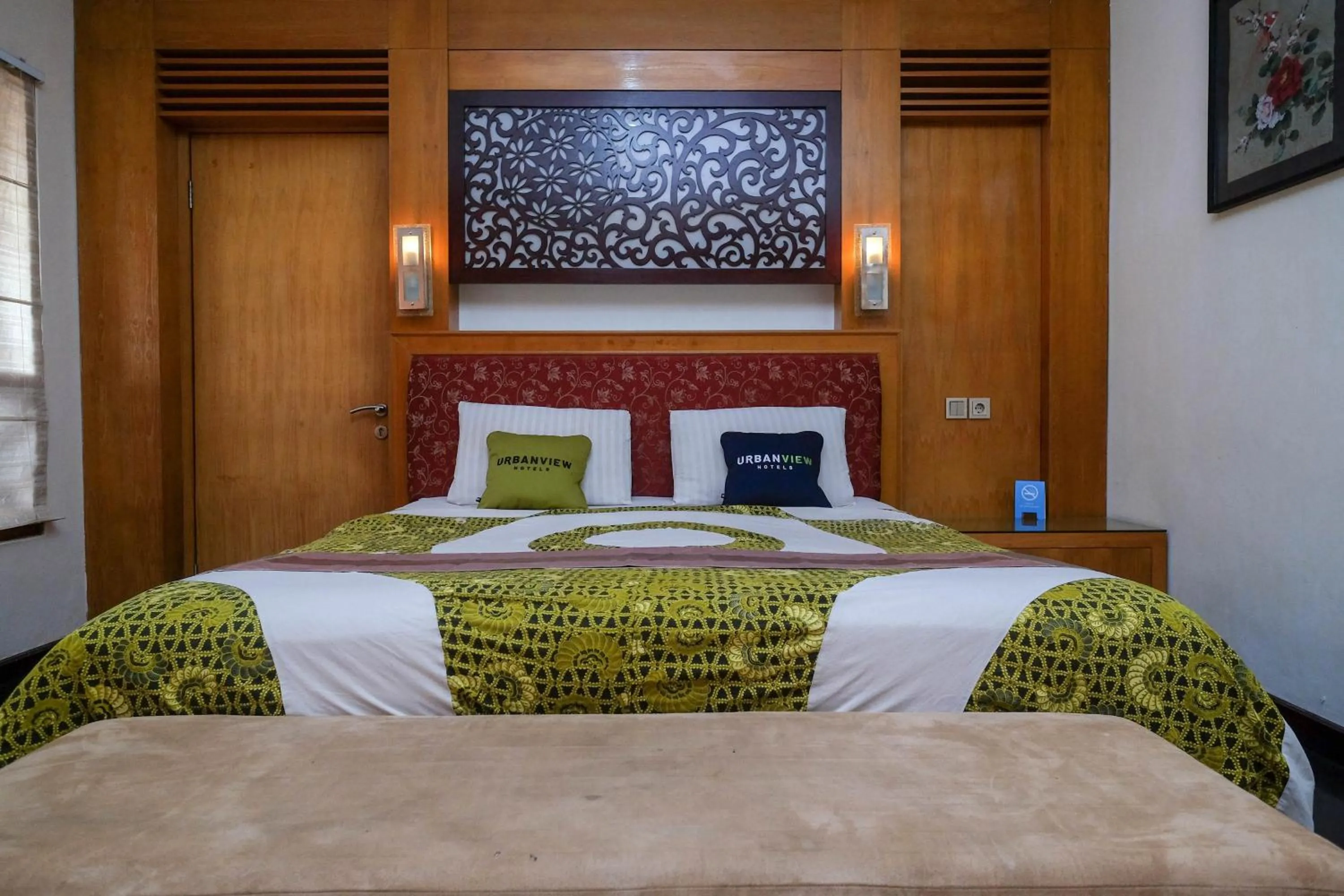 Bedroom, Bed in Urbanview Omah Eka Santi by RedDoorz