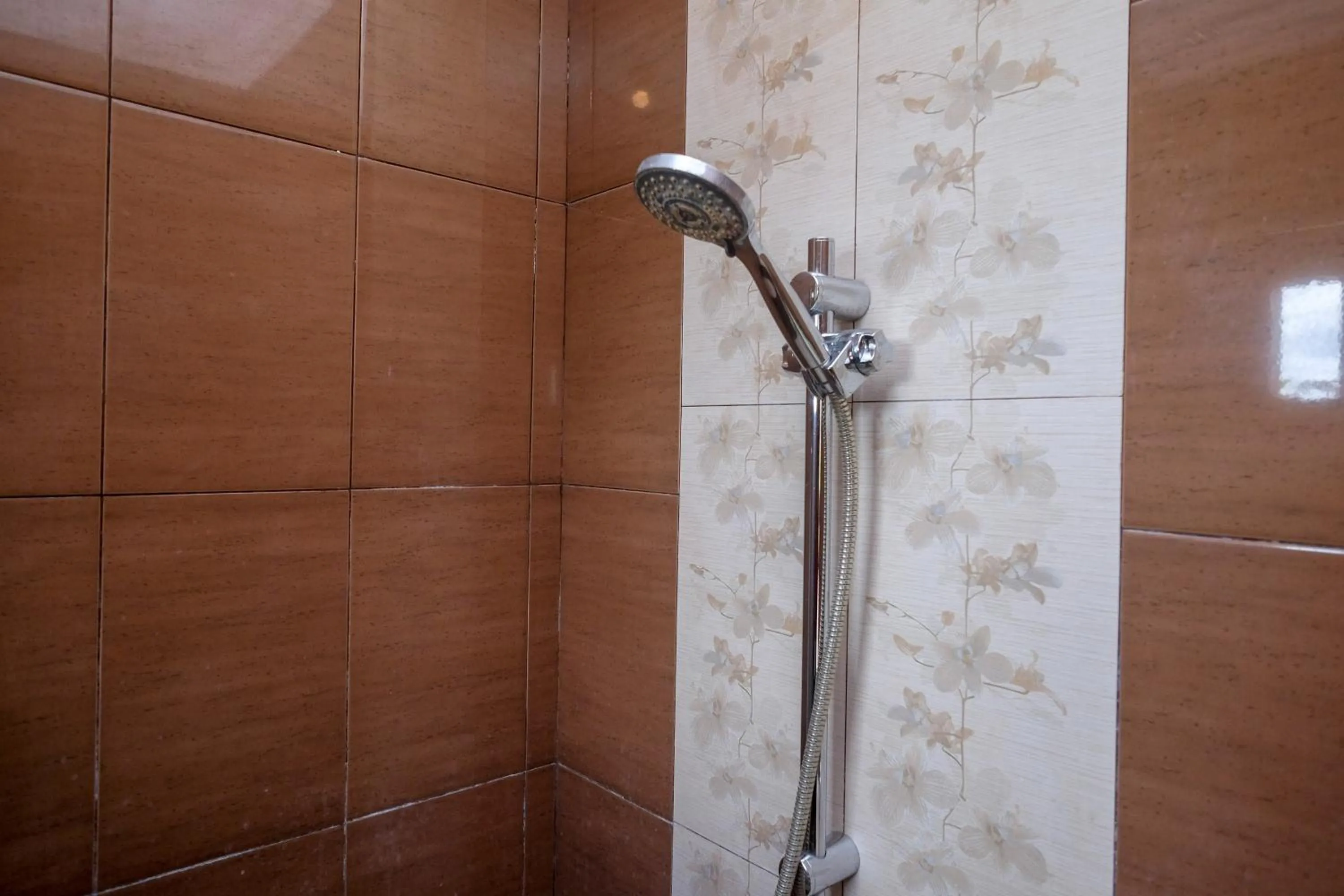 Bathroom in Urbanview Omah Eka Santi by RedDoorz