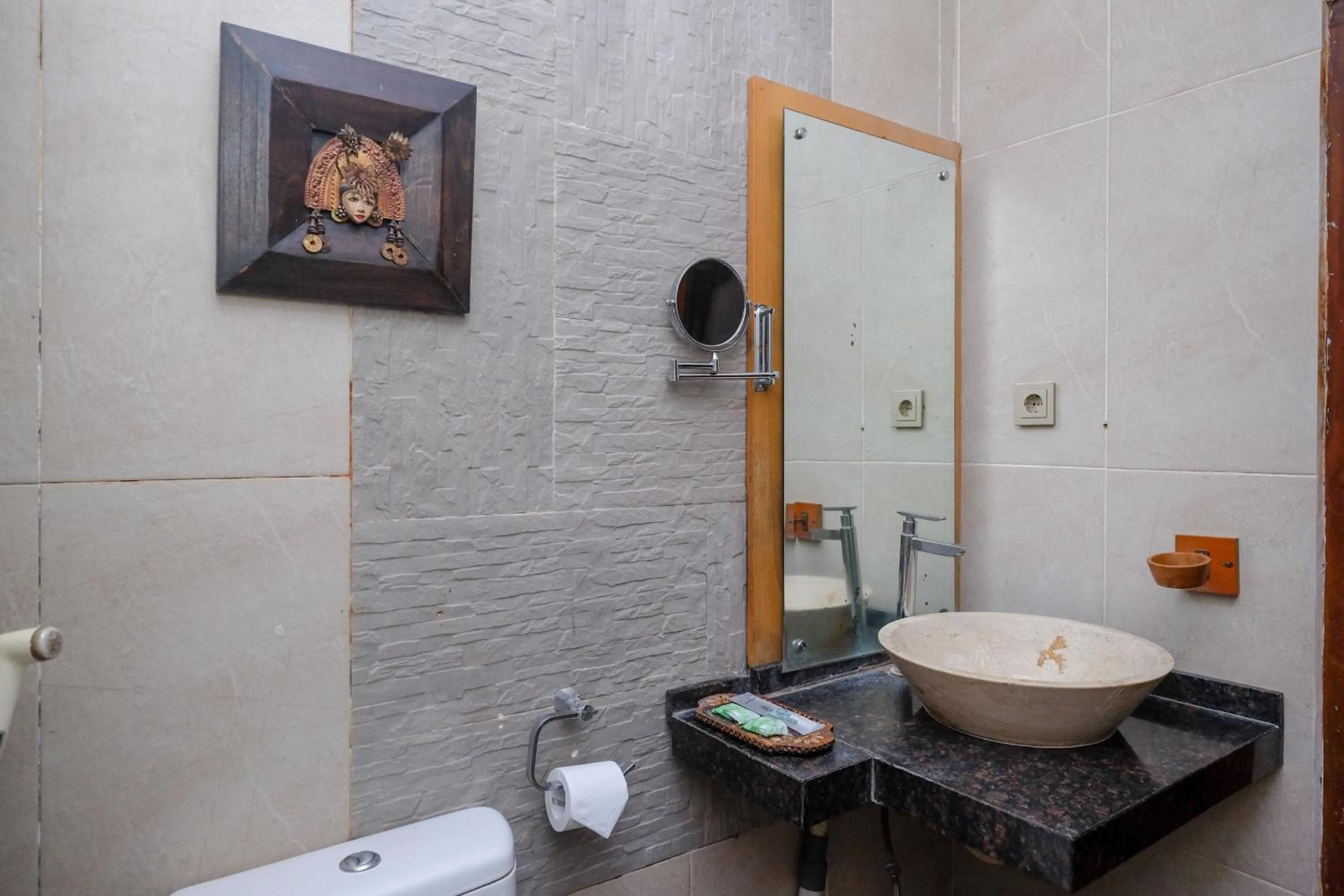 Bathroom in Urbanview Omah Eka Santi by RedDoorz