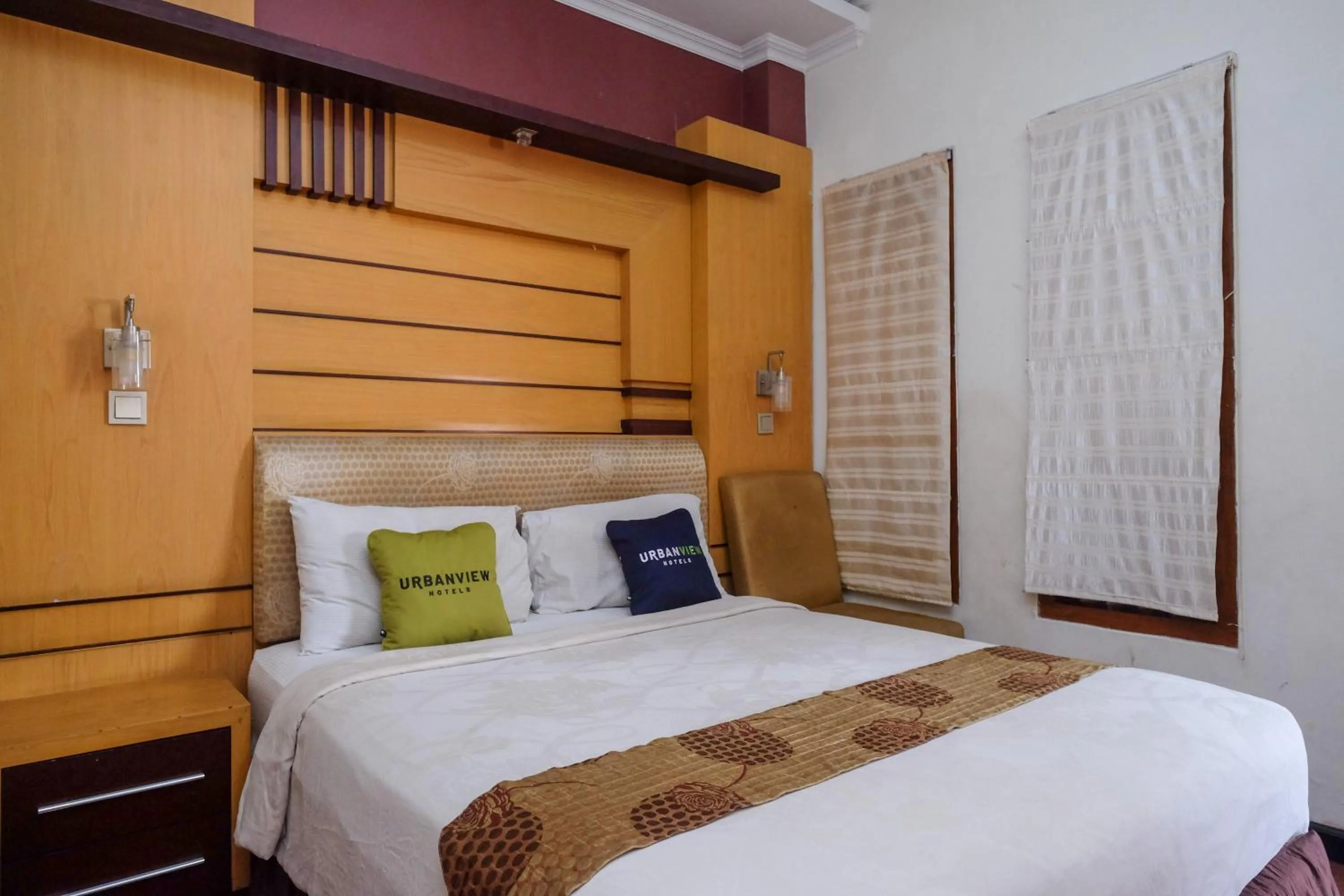 Bedroom, Bed in Urbanview Omah Eka Santi by RedDoorz