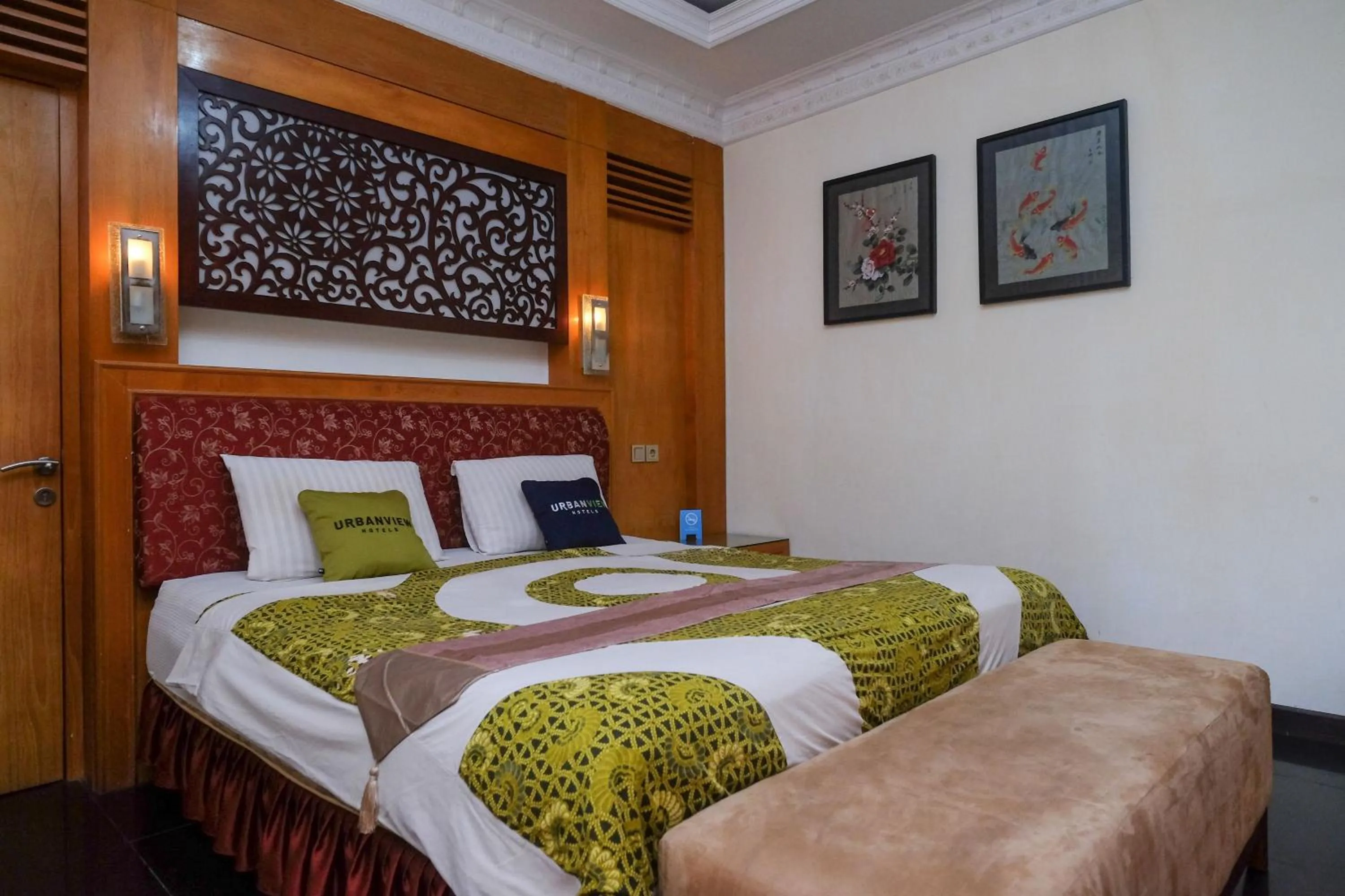 Bedroom, Bed in Urbanview Omah Eka Santi by RedDoorz