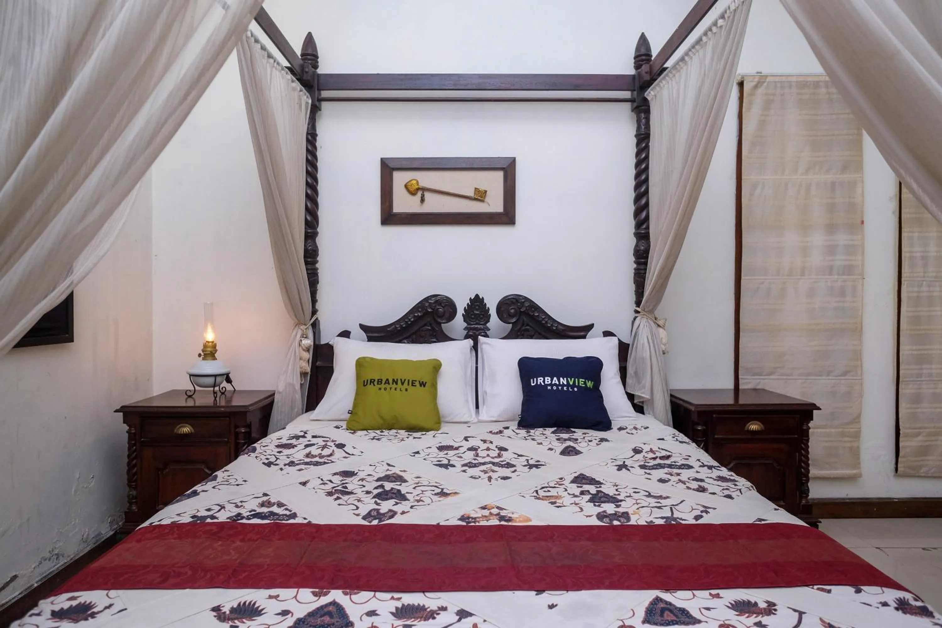 Bedroom, Bed in Urbanview Omah Eka Santi by RedDoorz