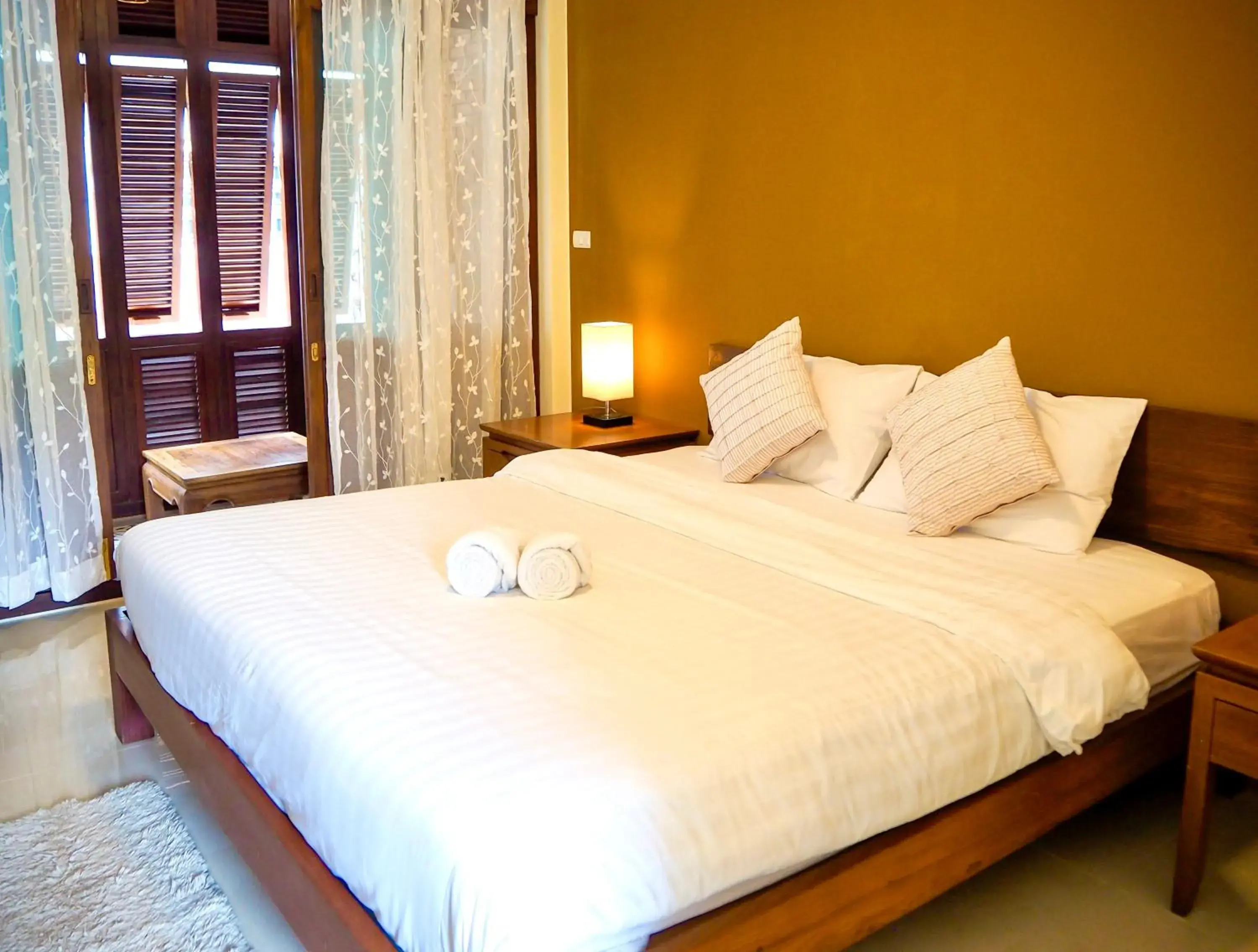 Bed in Baan Dan Ta Wan Nuea Bed in Baan Dan Ta Wan Nuea