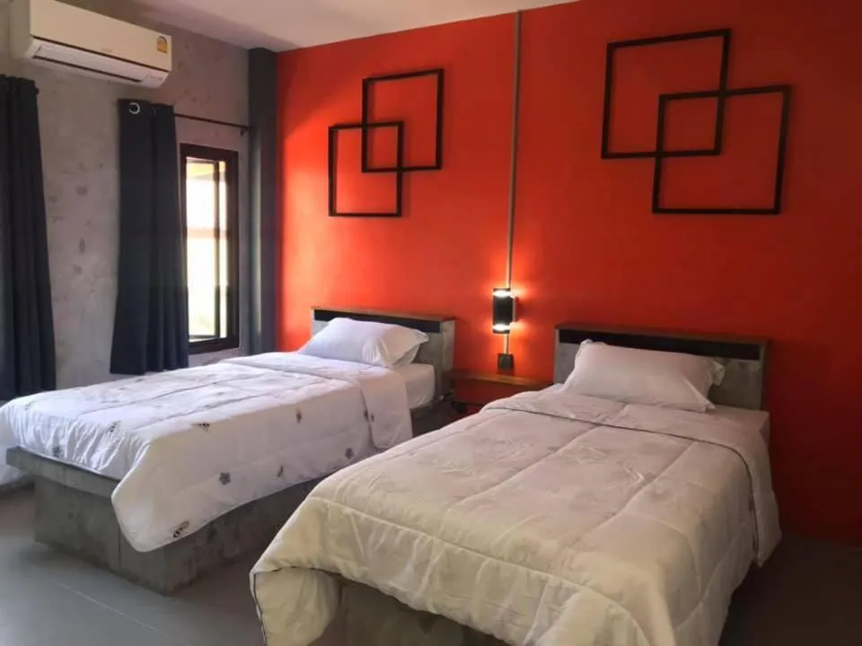Bed in Janrawee Resort