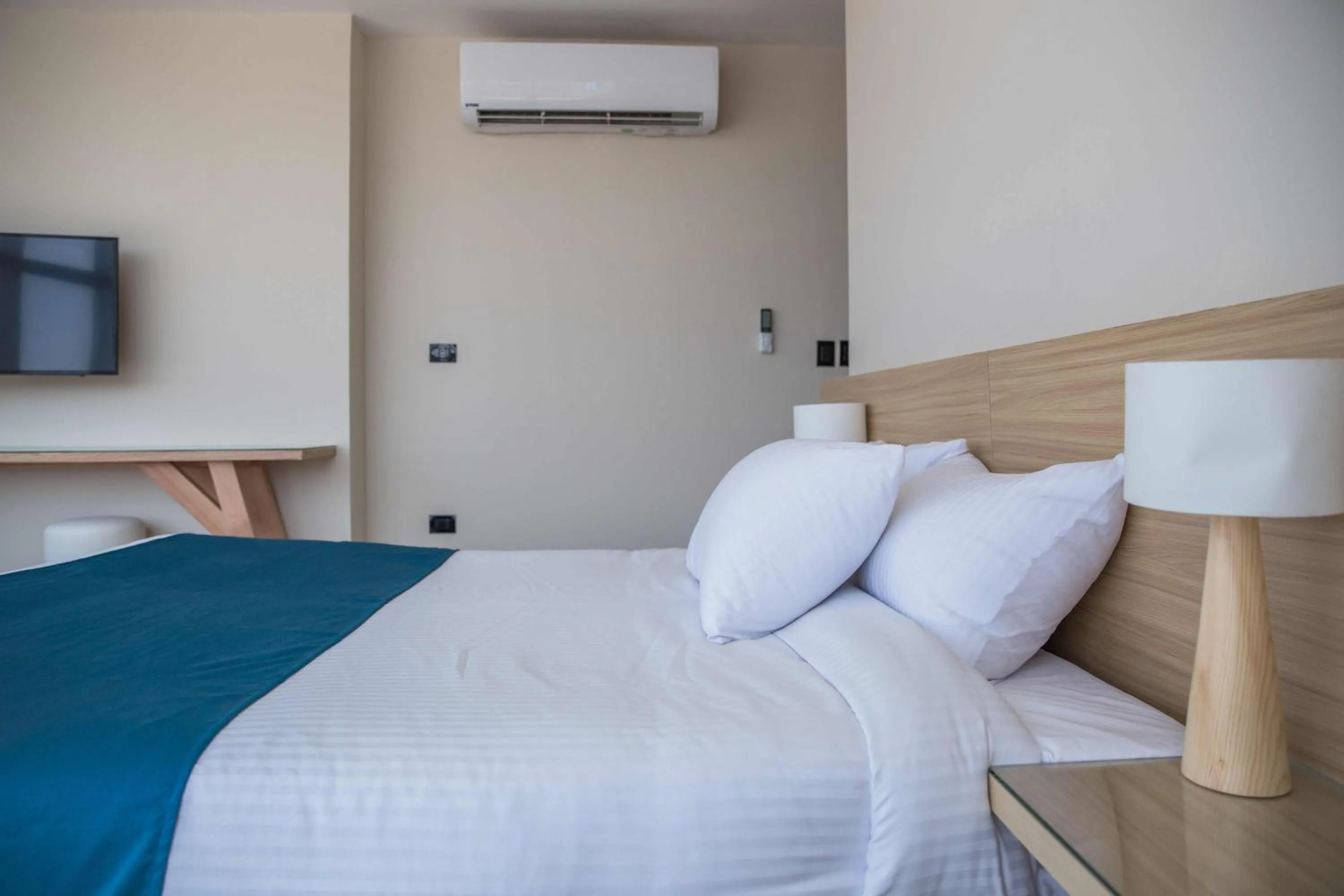 Bed in Redcon Suites