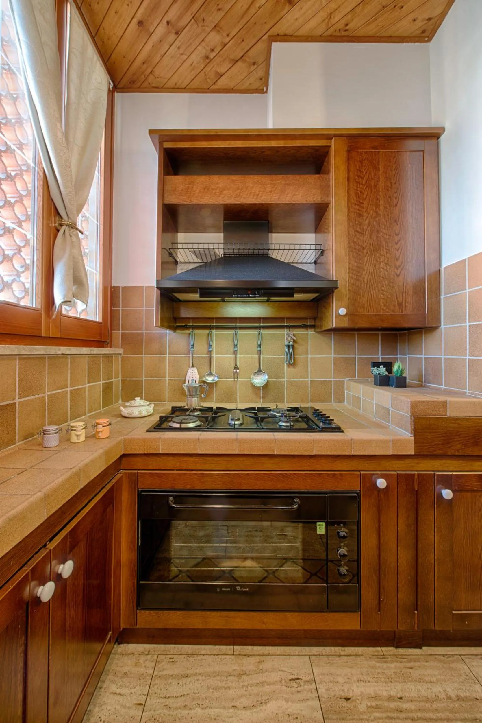 Kitchen or kitchenette in Residence Palazzo Gasparroni