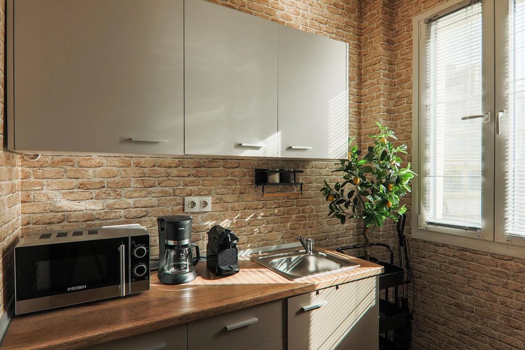 Kitchen or kitchenette in Superior One Luxury Apartments