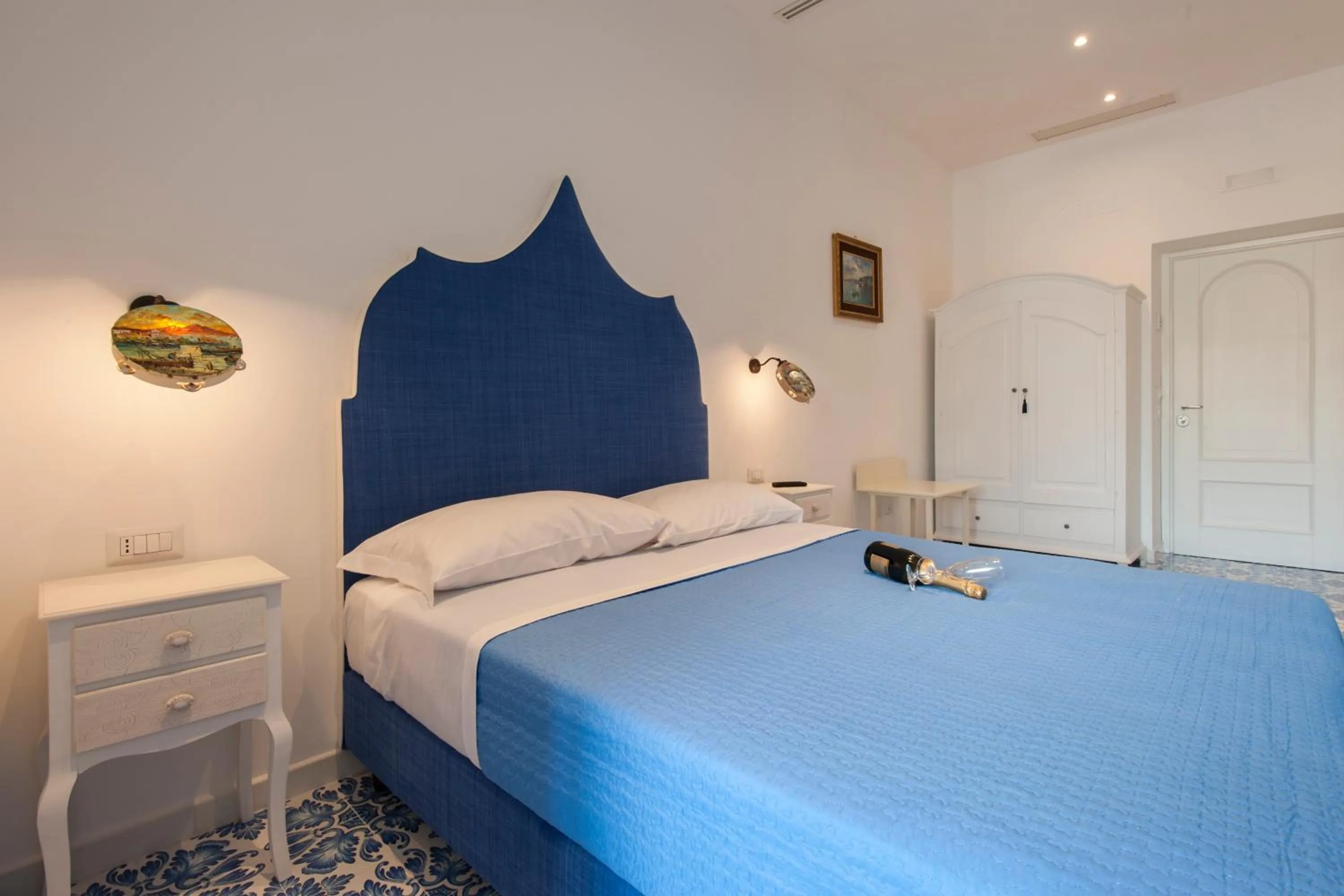 Bed in Surriento Suites