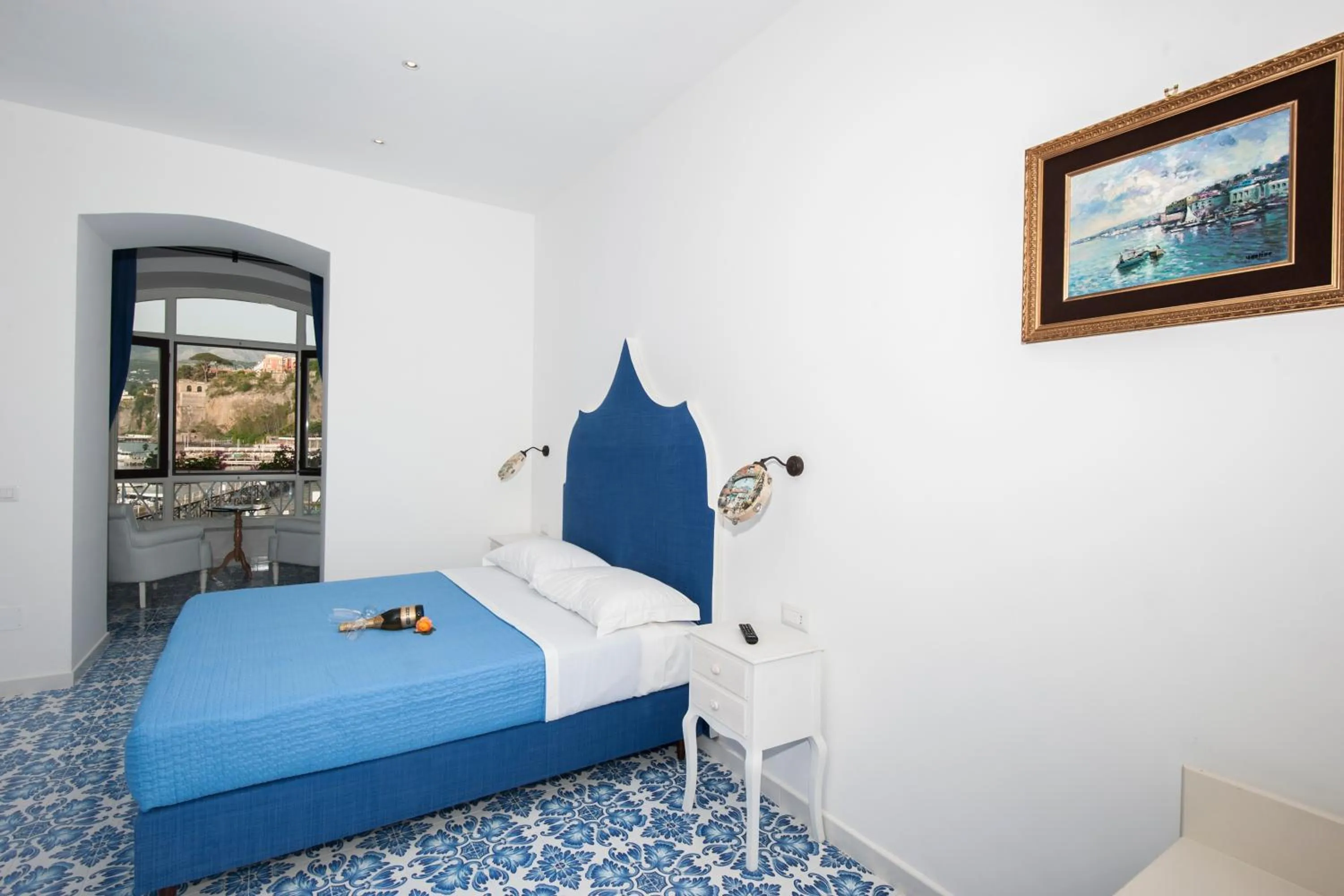 Bed in Surriento Suites