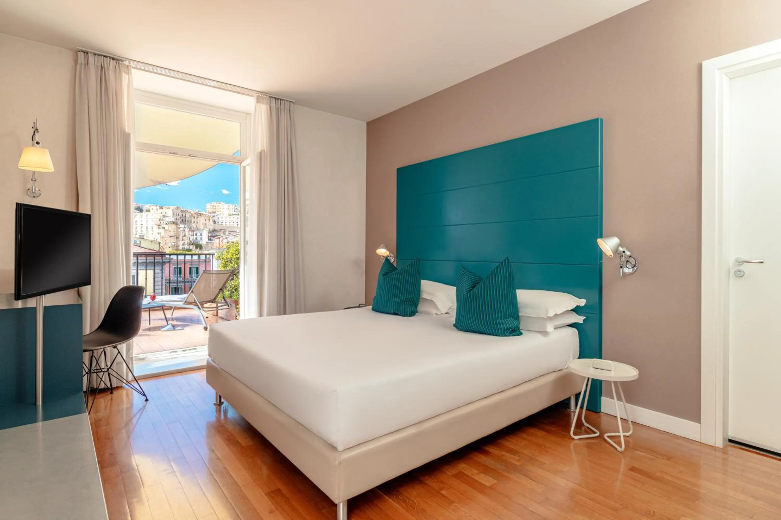 Bedroom, Bed in Hotel Piazza Bellini & Apartments