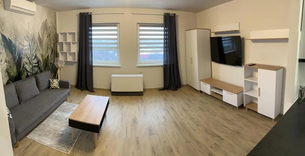 Communal lounge/ TV room in Delta Apart-House