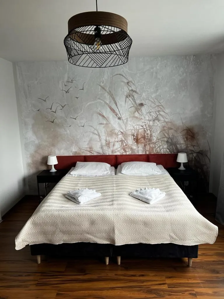 Bed in Delta Apart-House