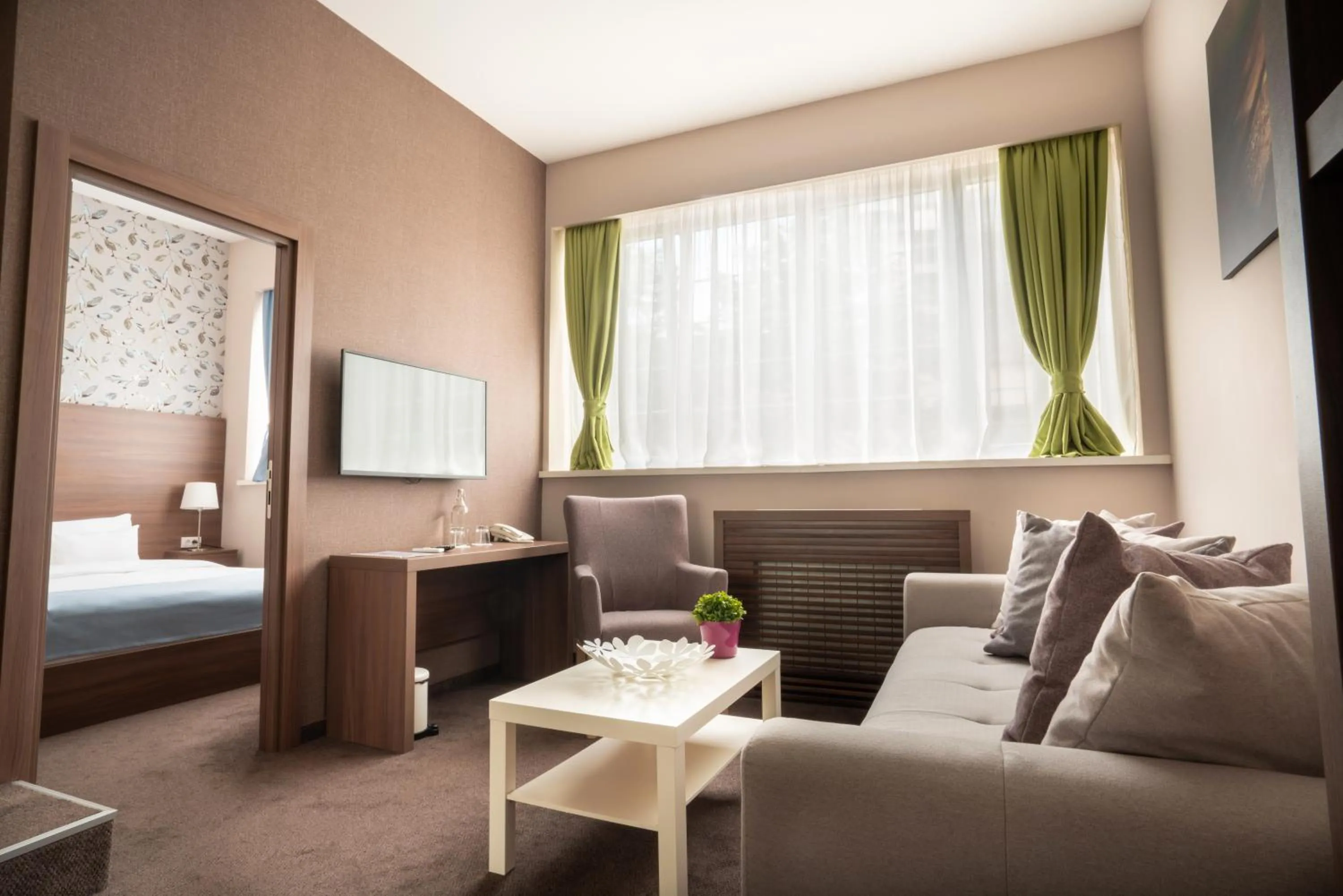 Living room, Bed in Veneti Suites