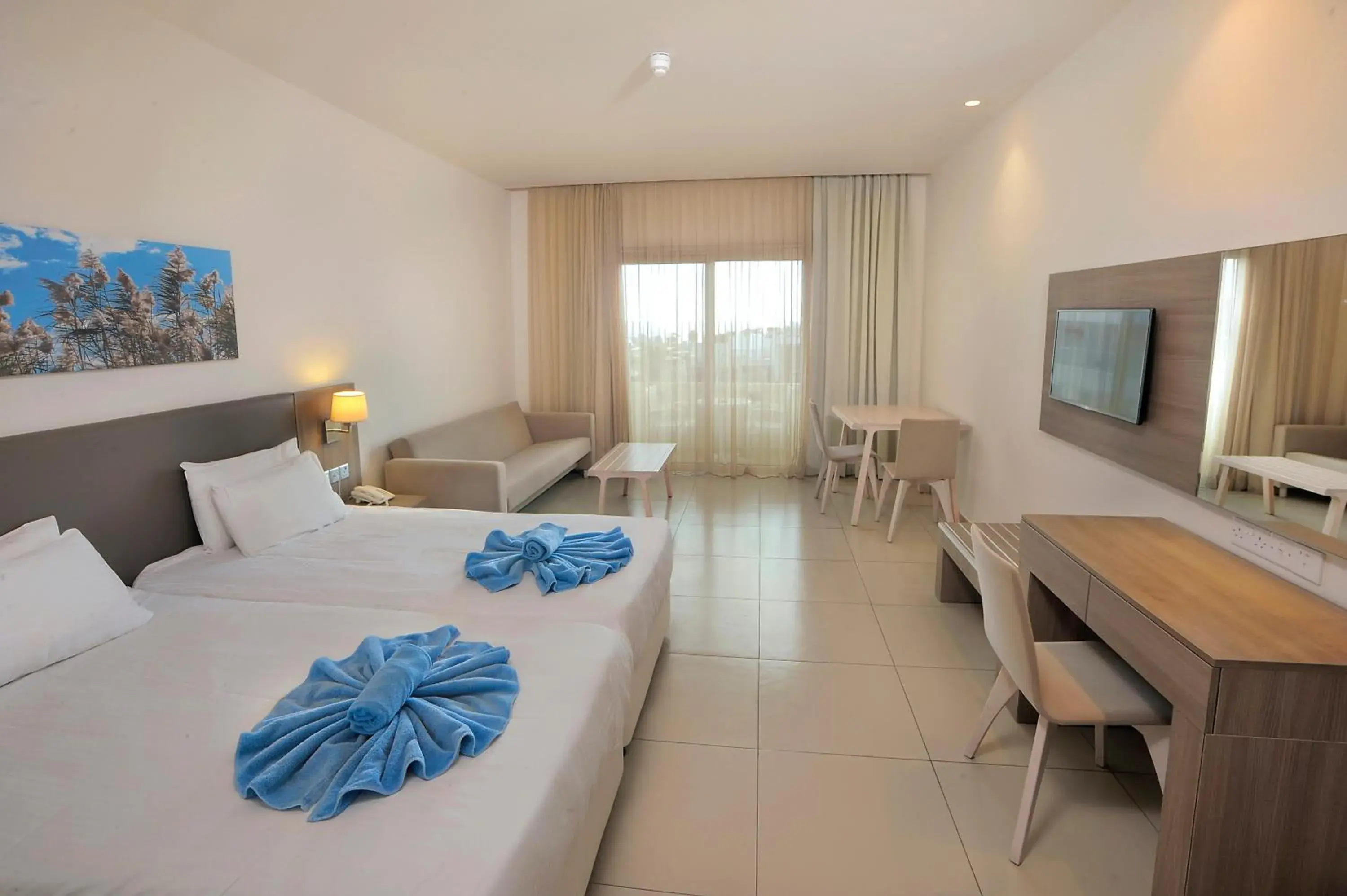 Bed in Euronapa Hotel Apartments Bed in Euronapa Hotel Apartments