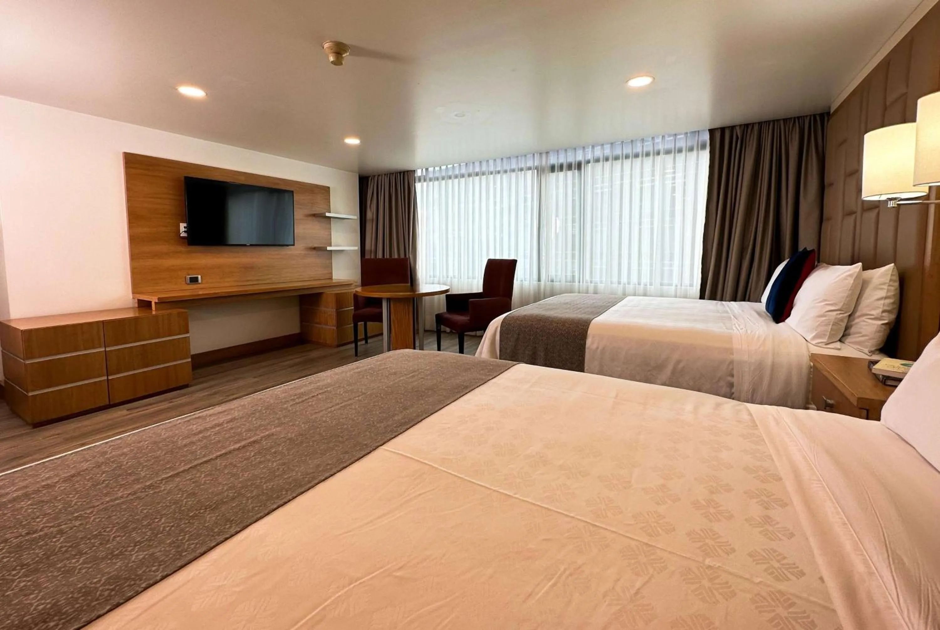 Photo of the whole room, Bed in Wyndham Garden Quito