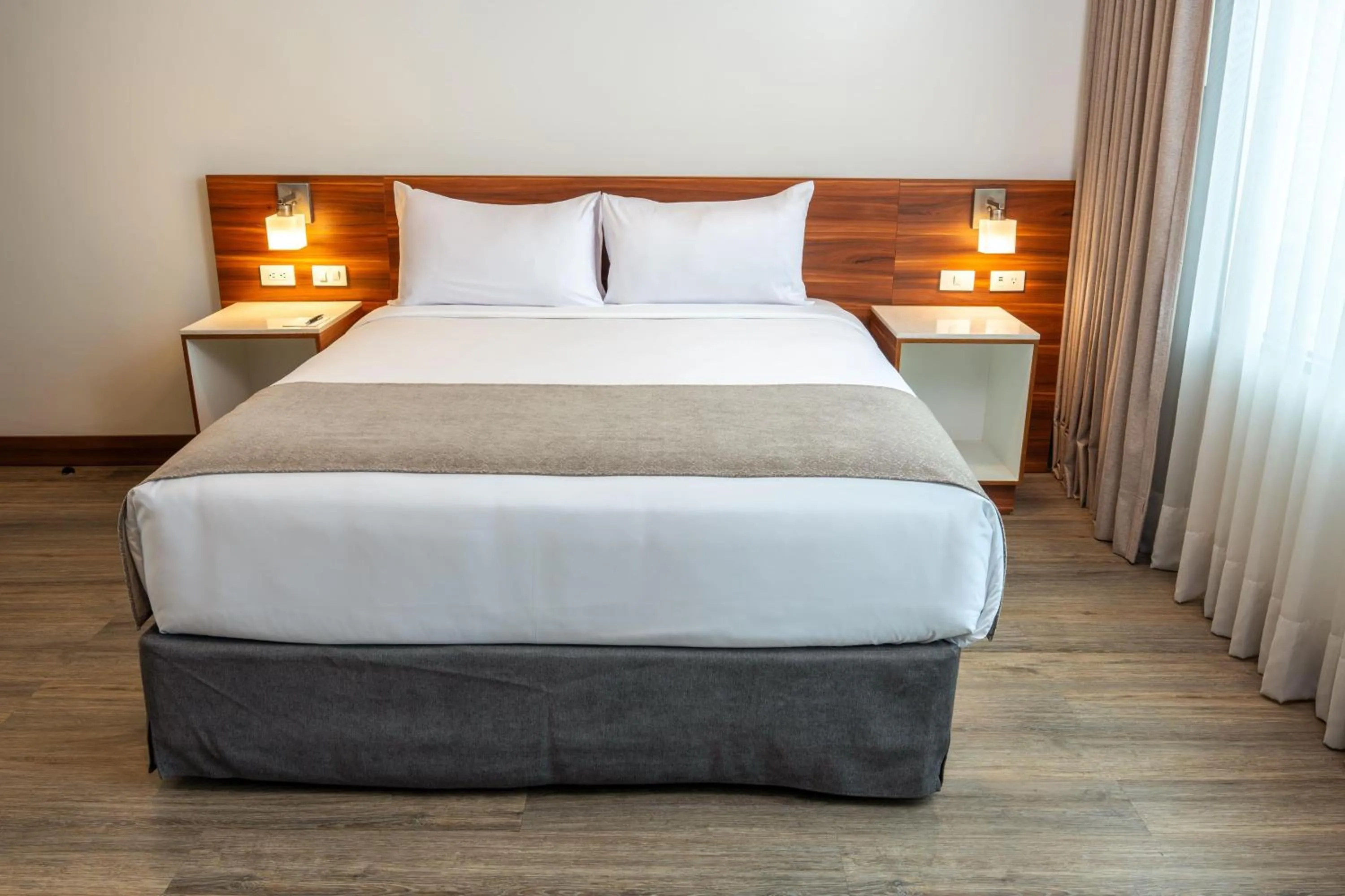 Photo of the whole room, Bed in Wyndham Garden Quito