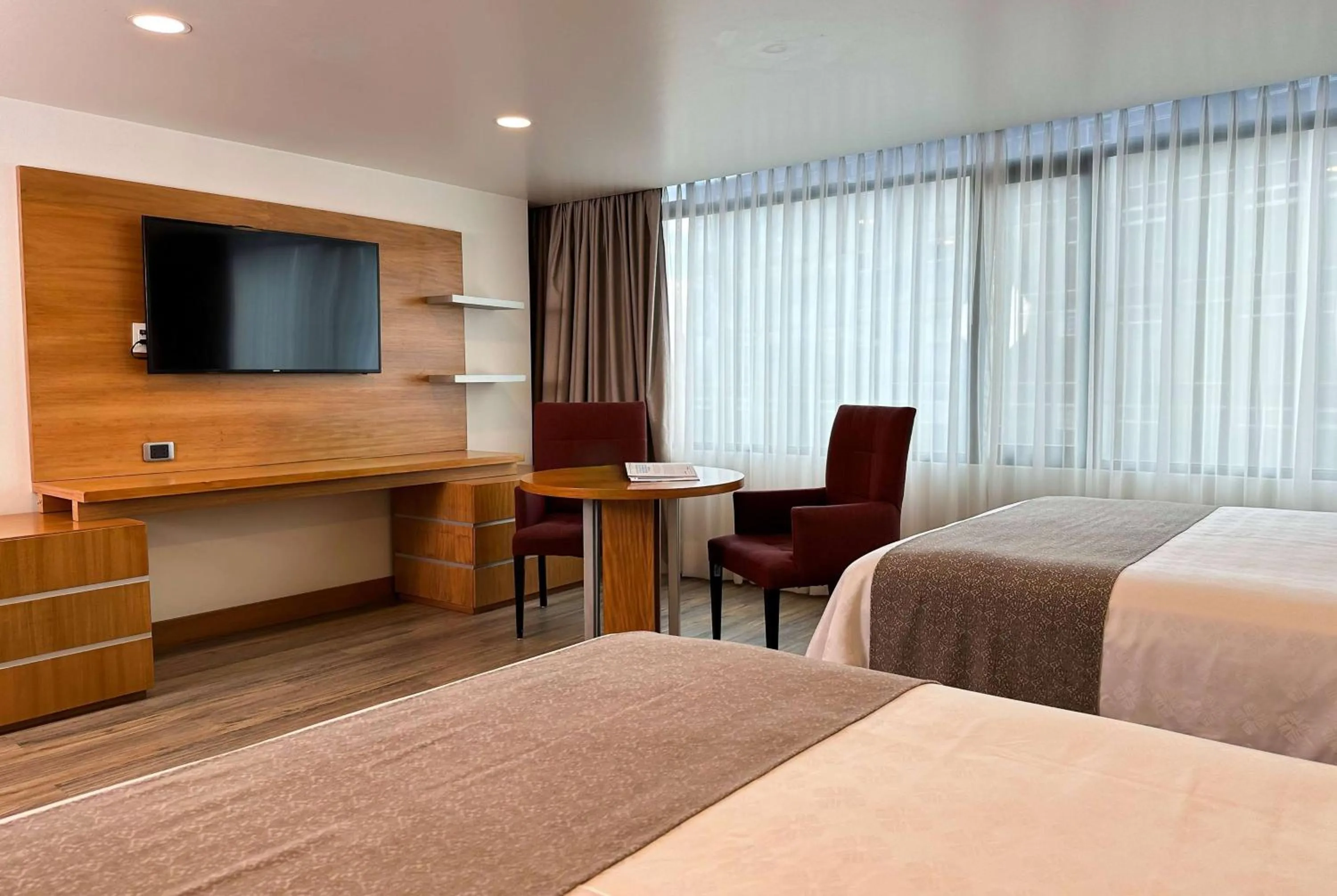 Photo of the whole room, Bed in Wyndham Garden Quito