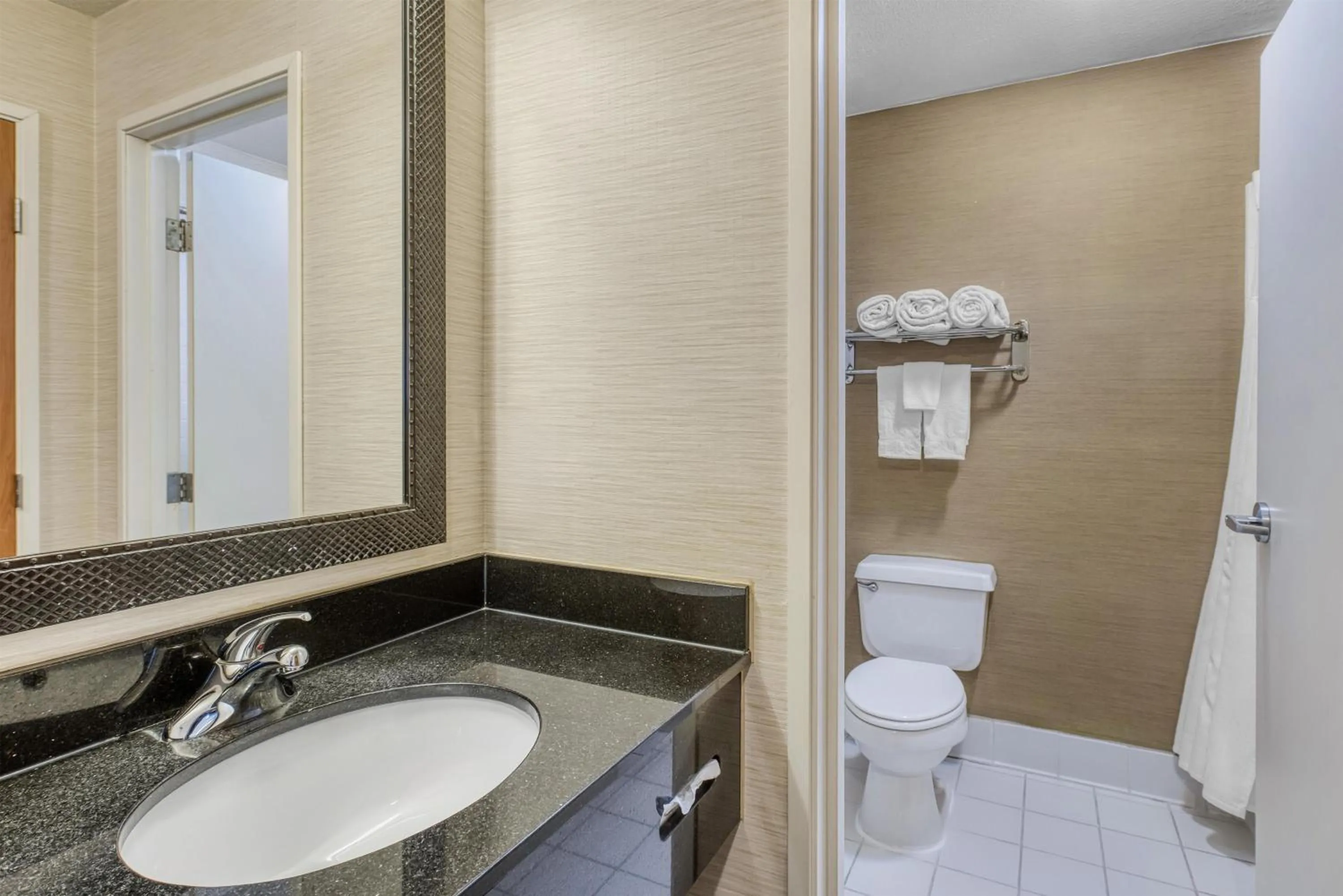 Bathroom in SureStay by Best Western Mount Pleasant Racine