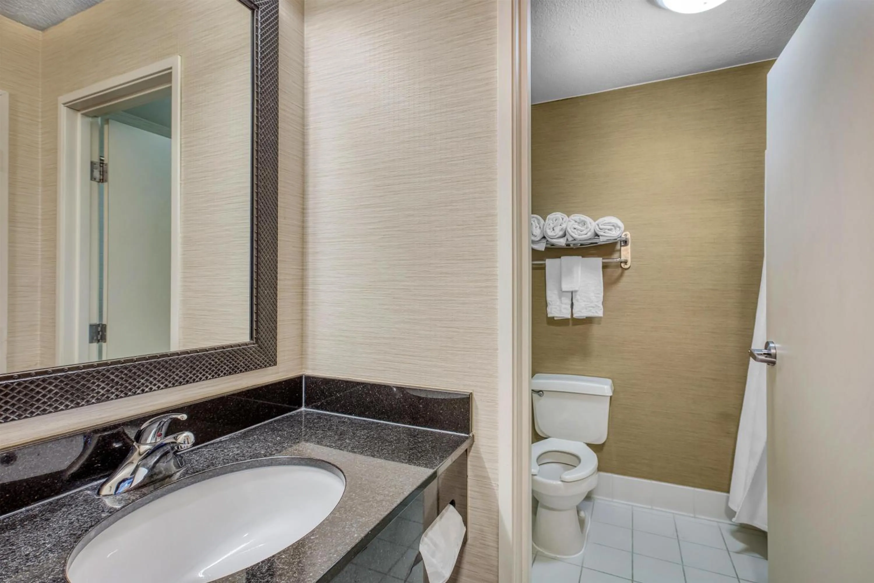 Bathroom in SureStay by Best Western Mount Pleasant Racine