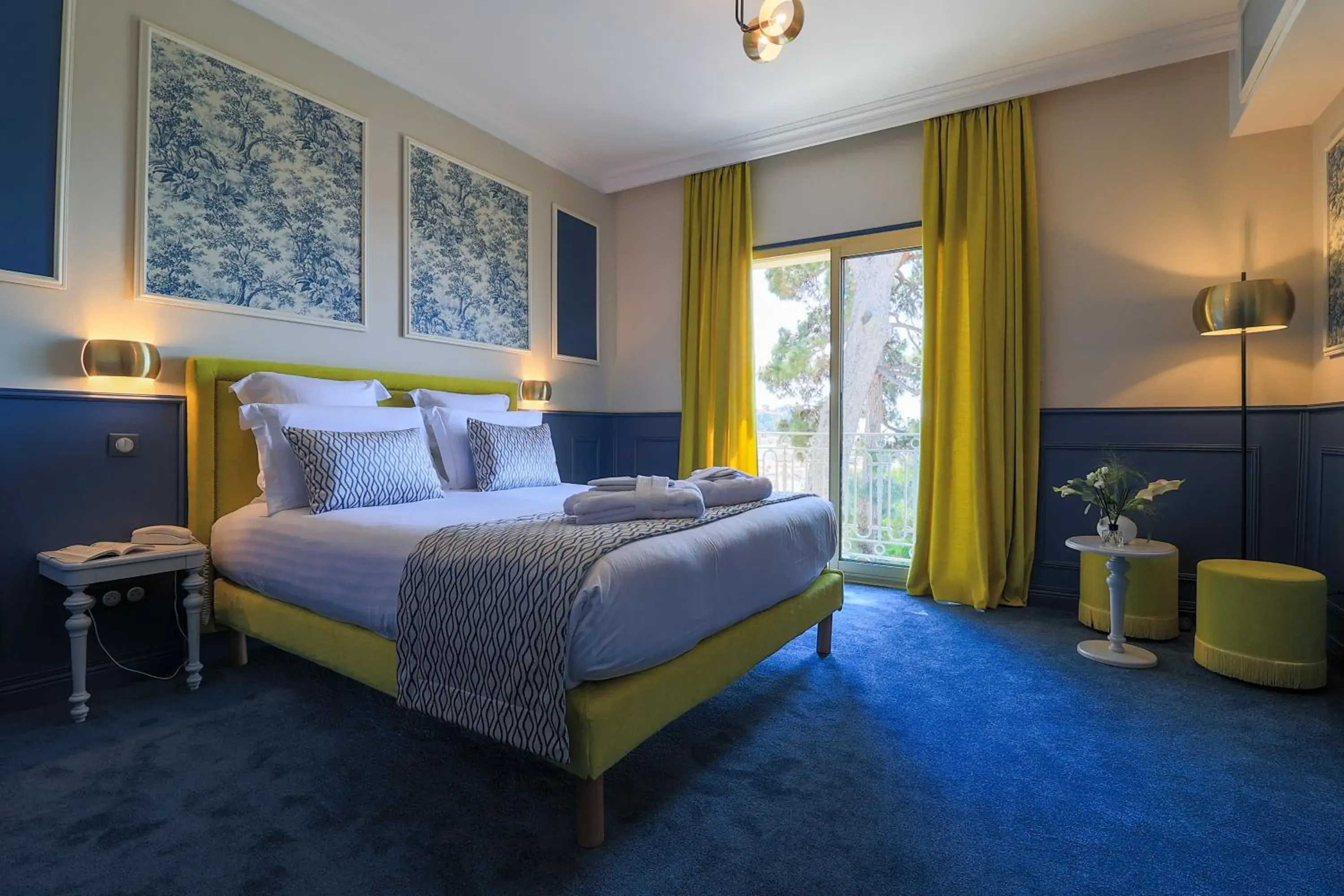 Bedroom in Hôtel Le Petit Palais