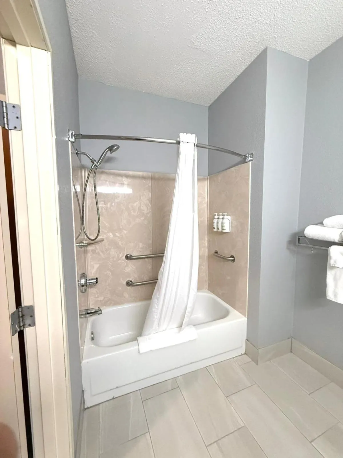 Shower in AmericInn by Wyndham Minot