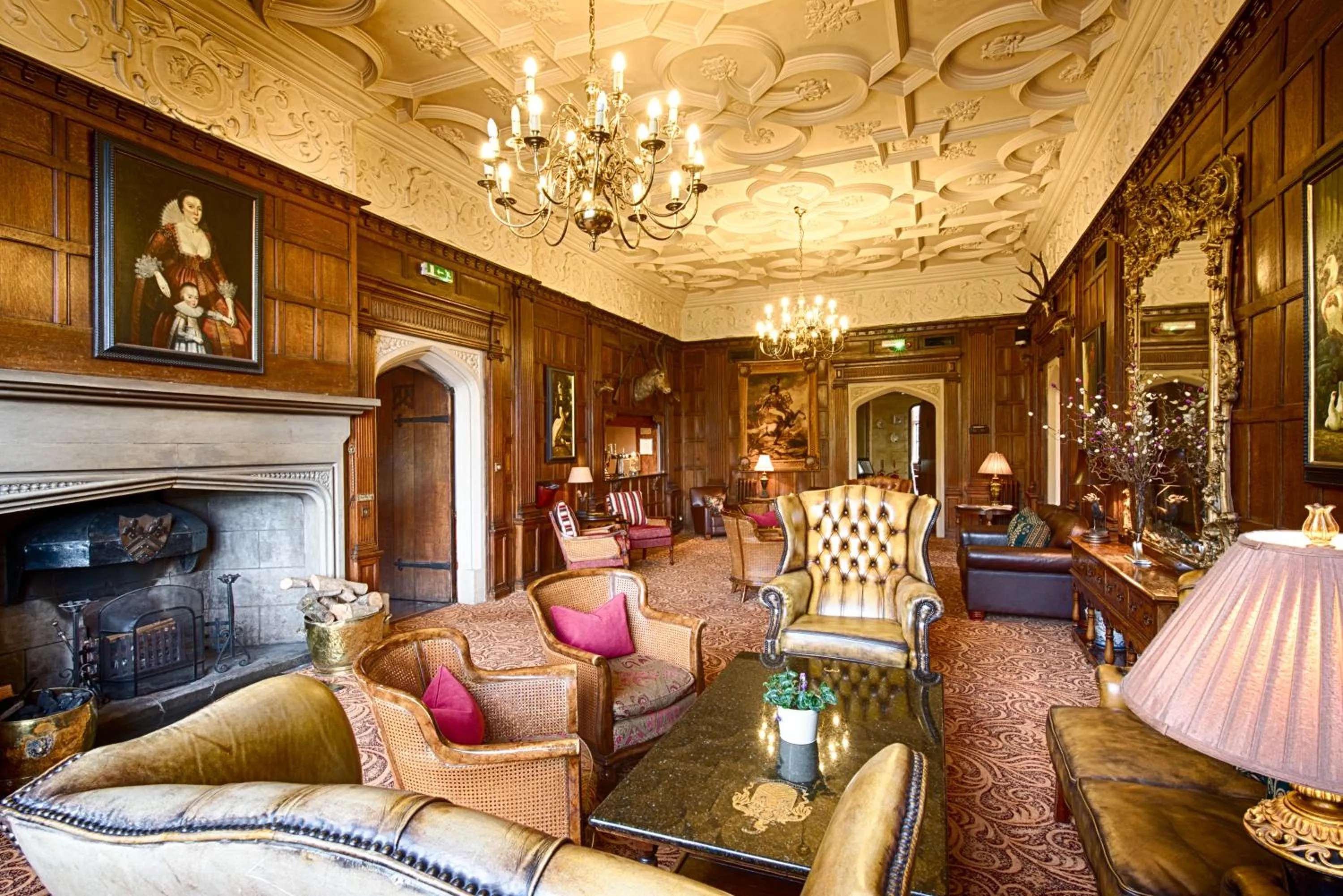 Communal lounge/ TV room in Miskin Manor Hotel