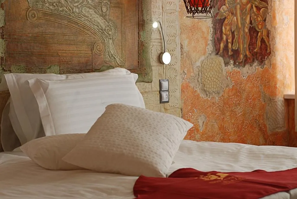 Bed in Diplomat Plaza Hotel & Resort