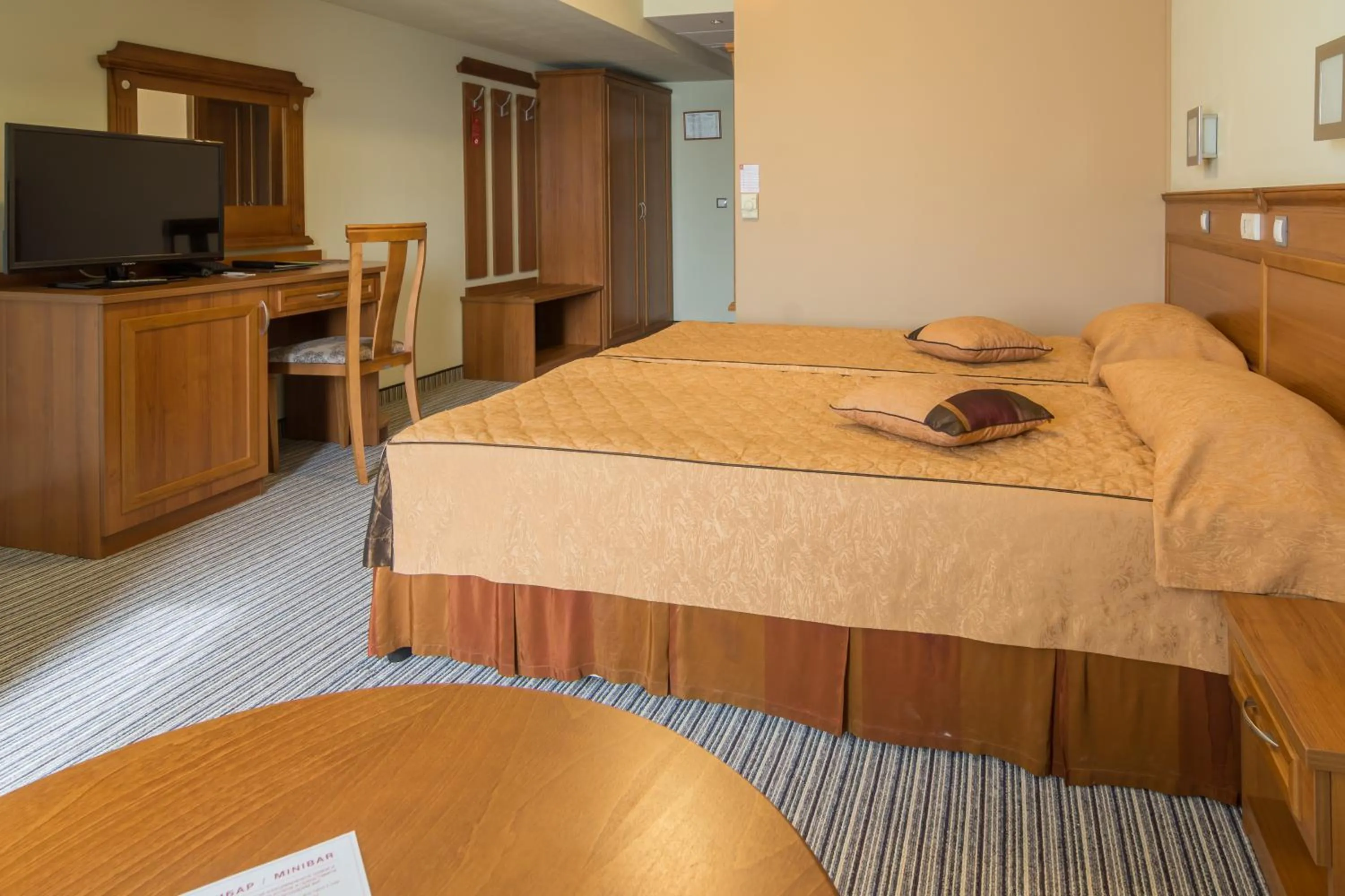 Bed in Diplomat Plaza Hotel & Resort