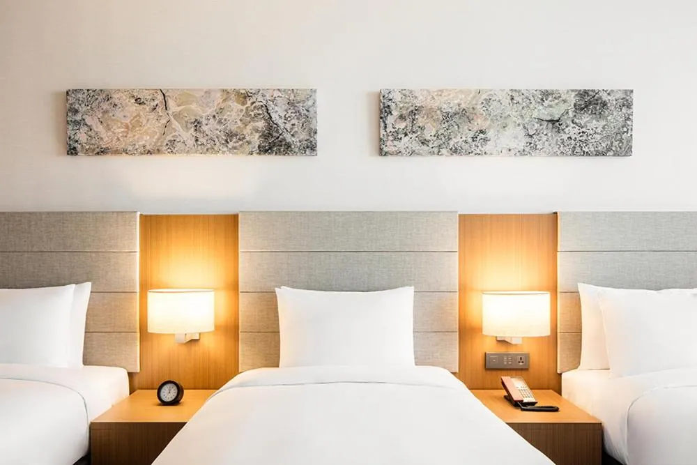 Bed in Ramada by Wyndham Seoul Sindorim