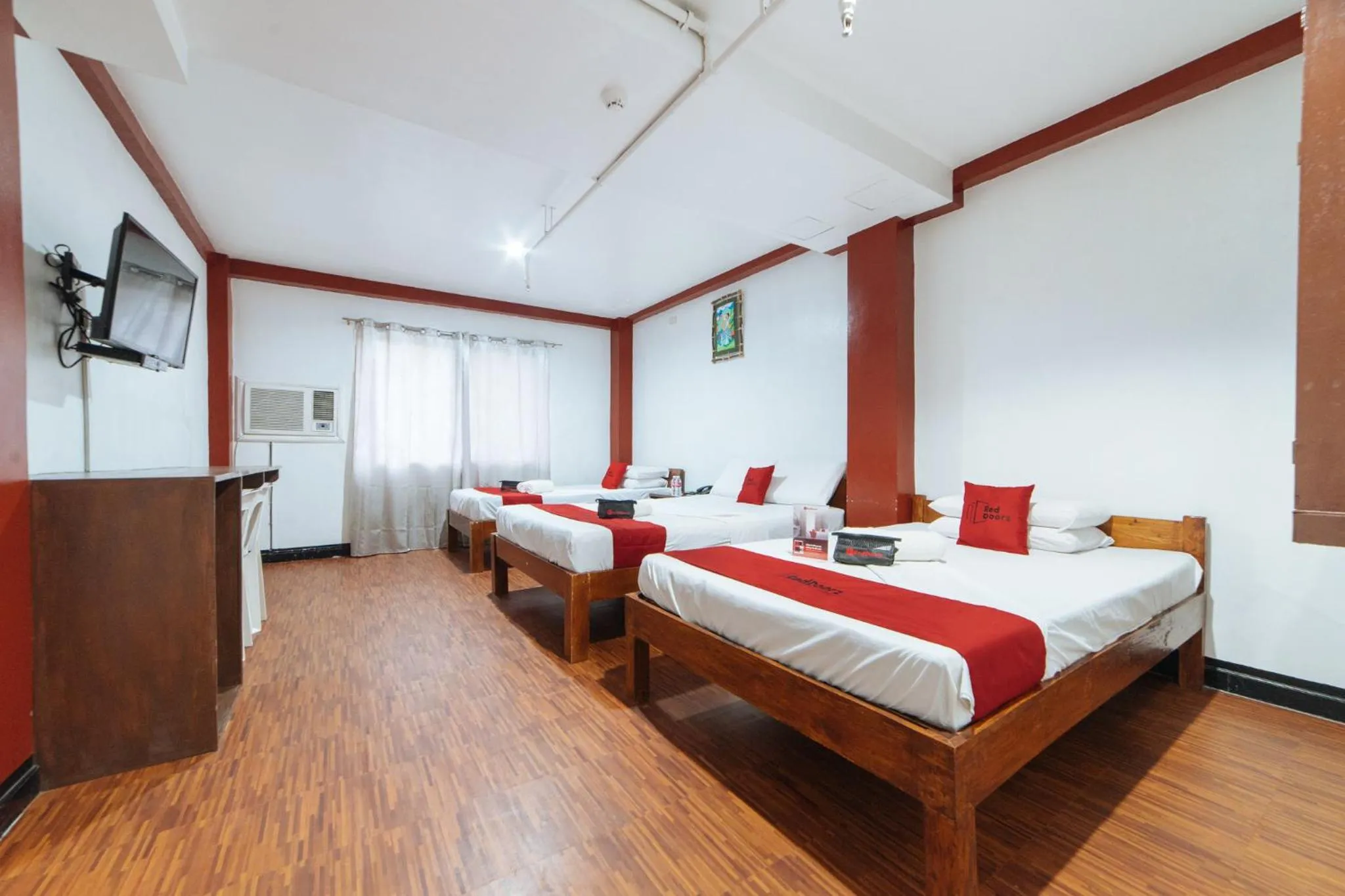 TV and multimedia, Bed in RedDoorz at Nirvana Pension House