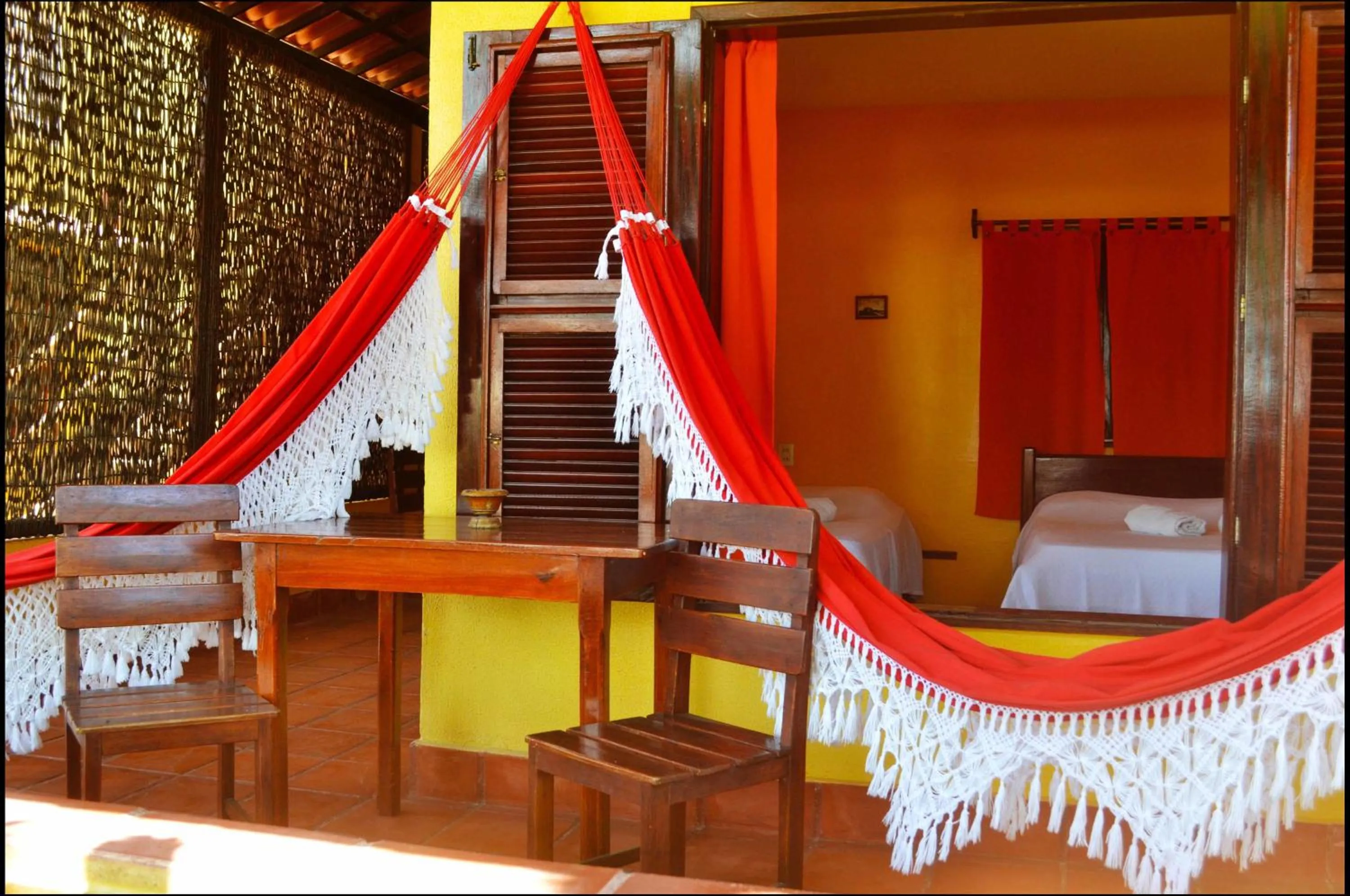 Living room, Bed in Pousada Sahara