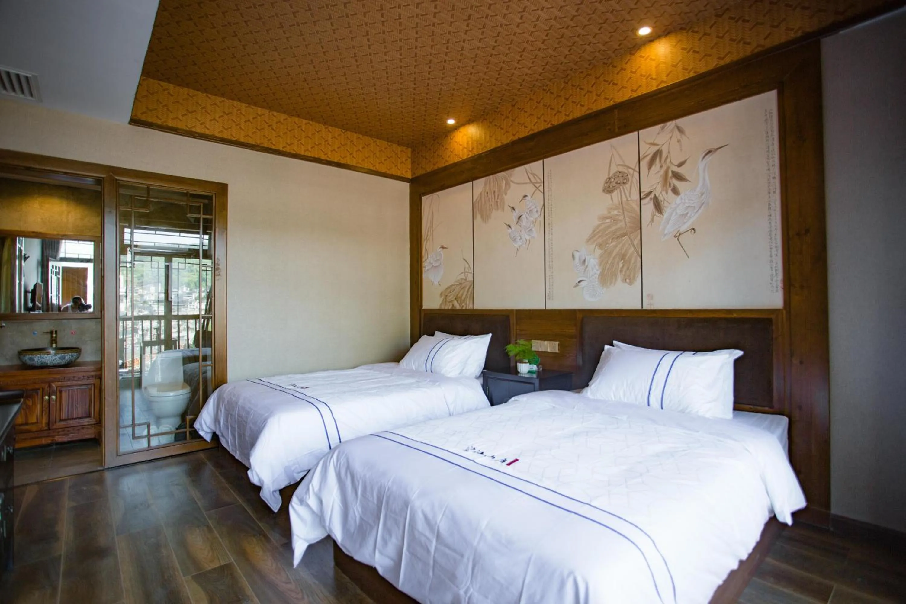 Bed in Wang Jiang Reclusive Boutique Inn