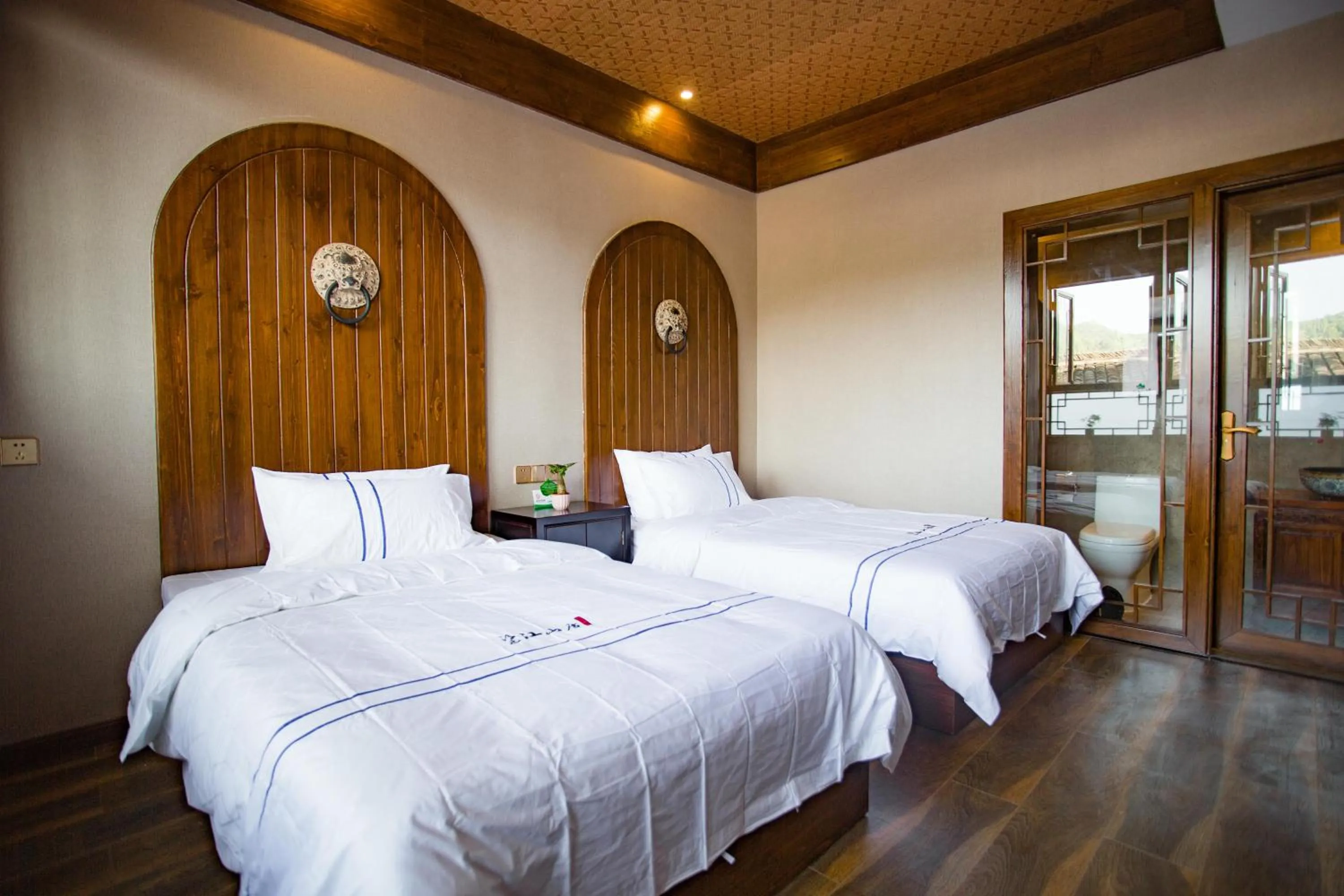 Bed in Wang Jiang Reclusive Boutique Inn