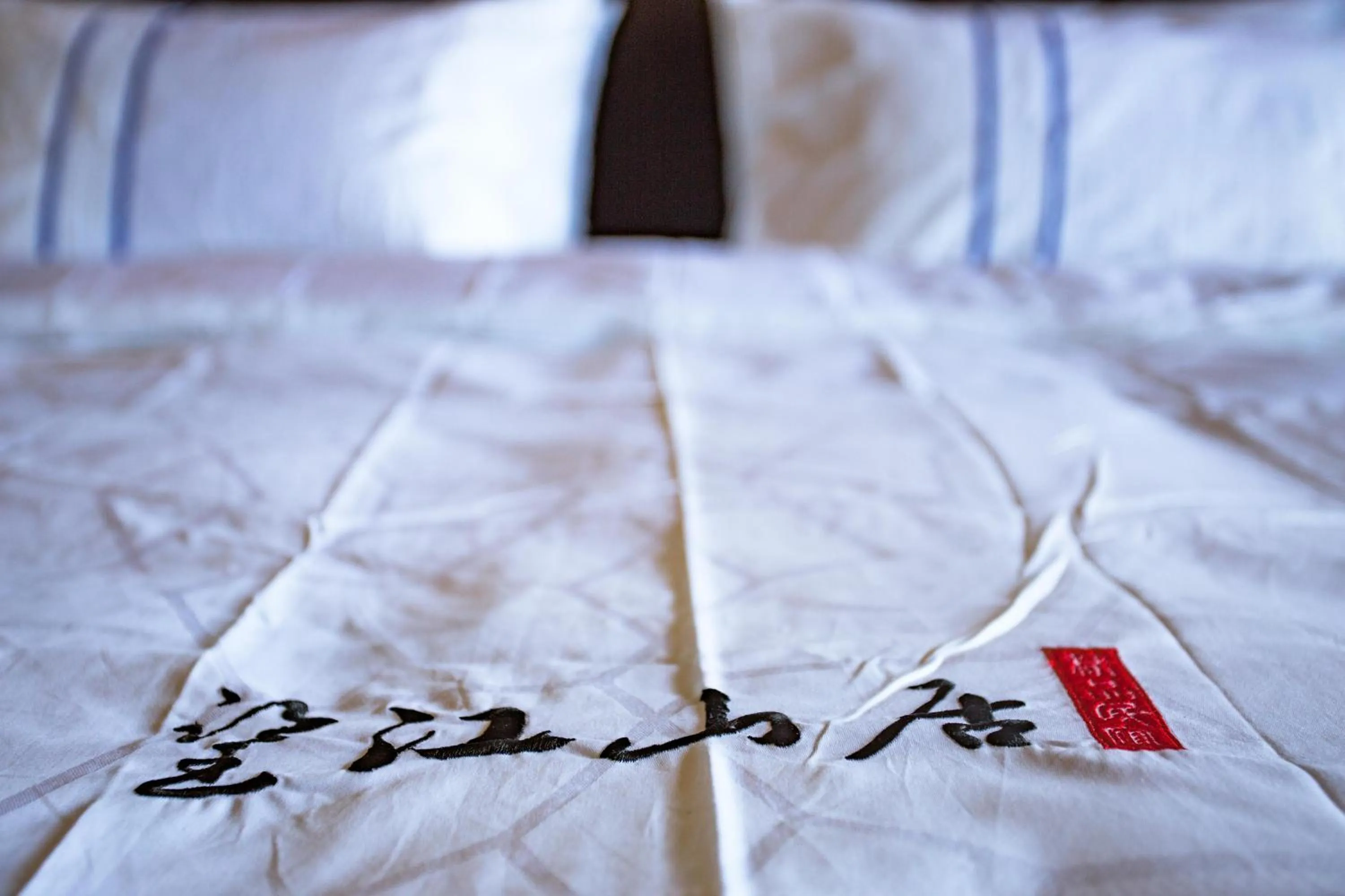 Bed in Wang Jiang Reclusive Boutique Inn