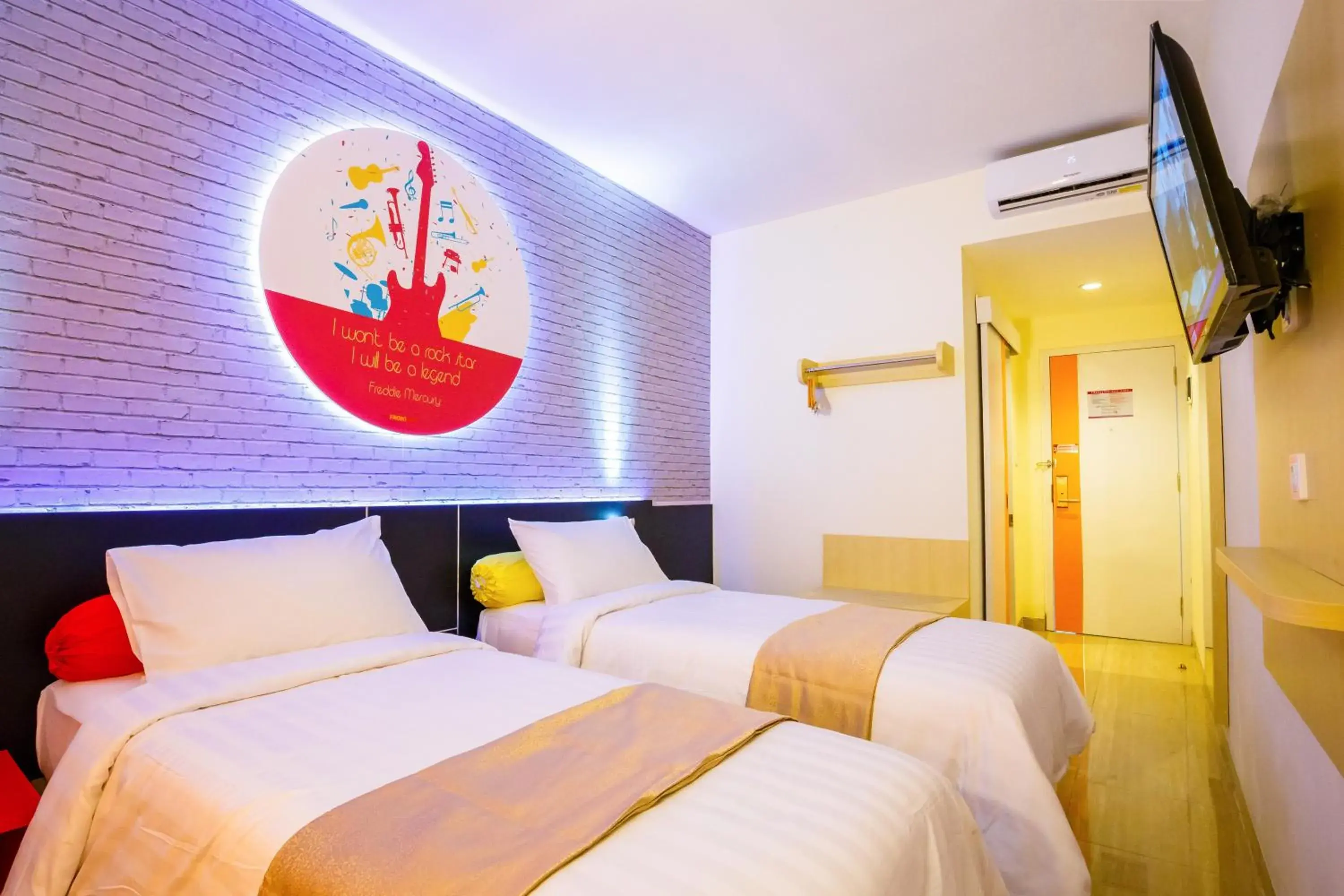 Bed in Front One Inn Muntilan Bed in Front One Inn Muntilan